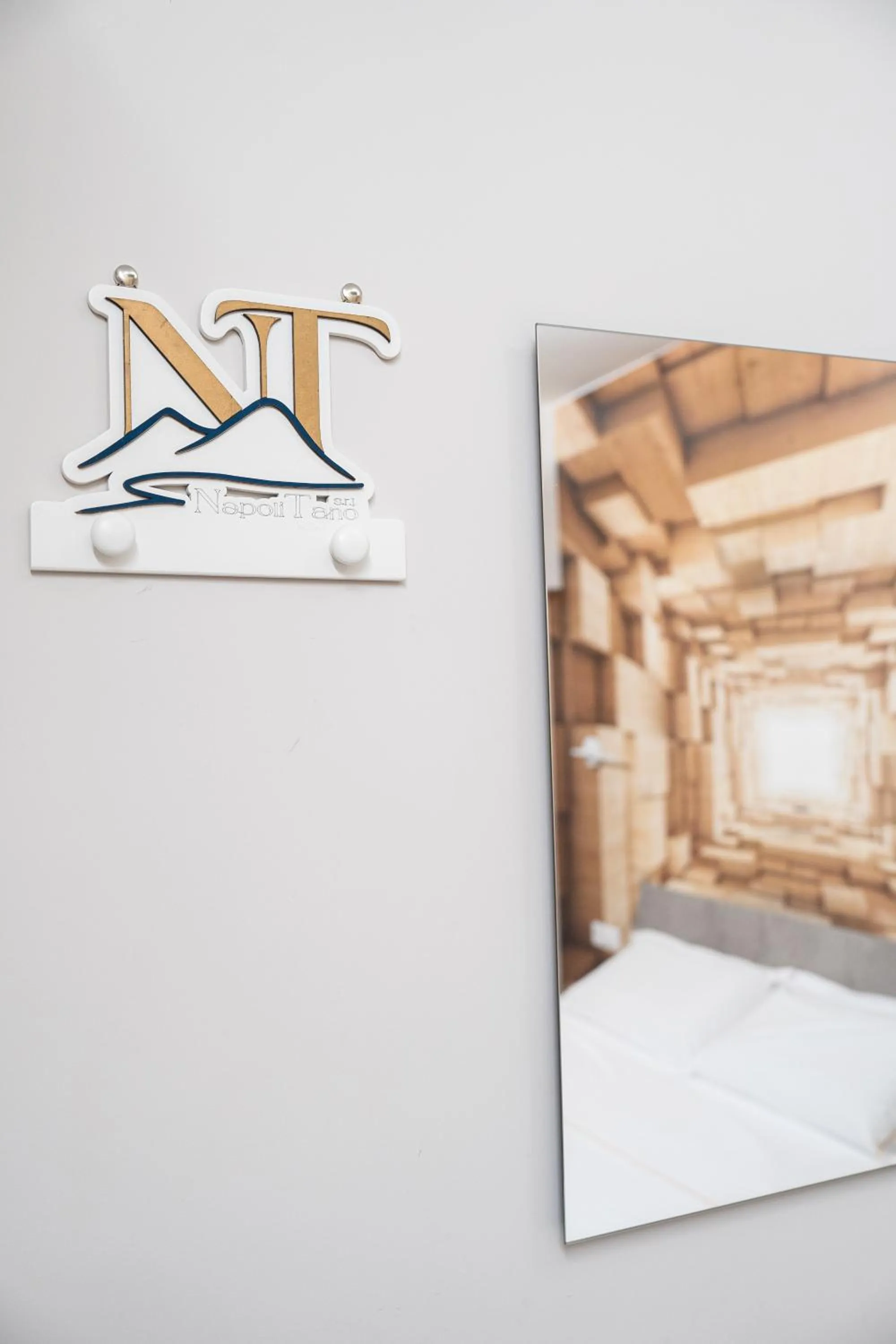 Logo/Certificate/Sign in Napolitano Rooms - Central Station