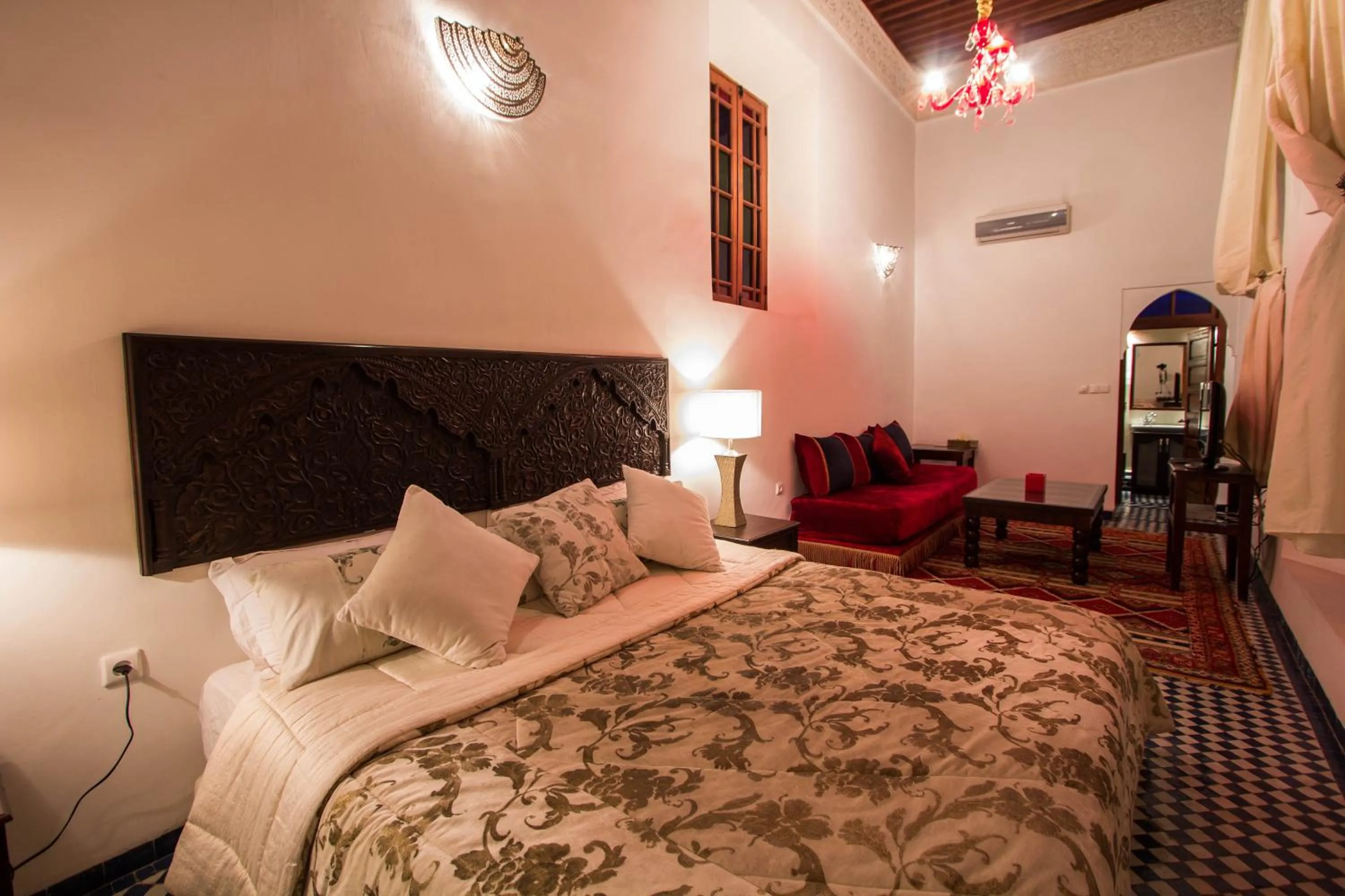 Photo of the whole room, Bed in Riad Noujoum Medina