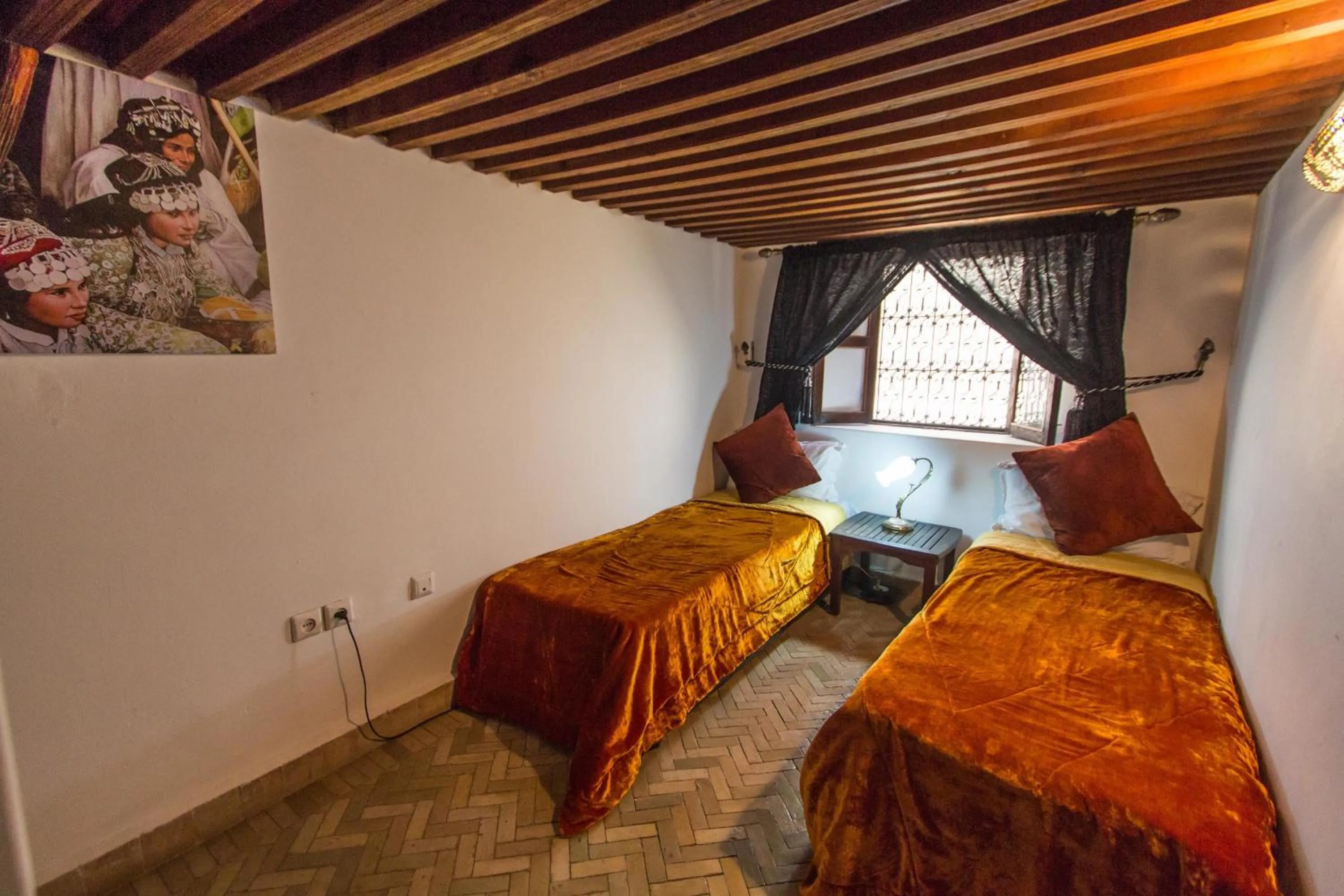 Photo of the whole room, Bed in Riad Noujoum Medina