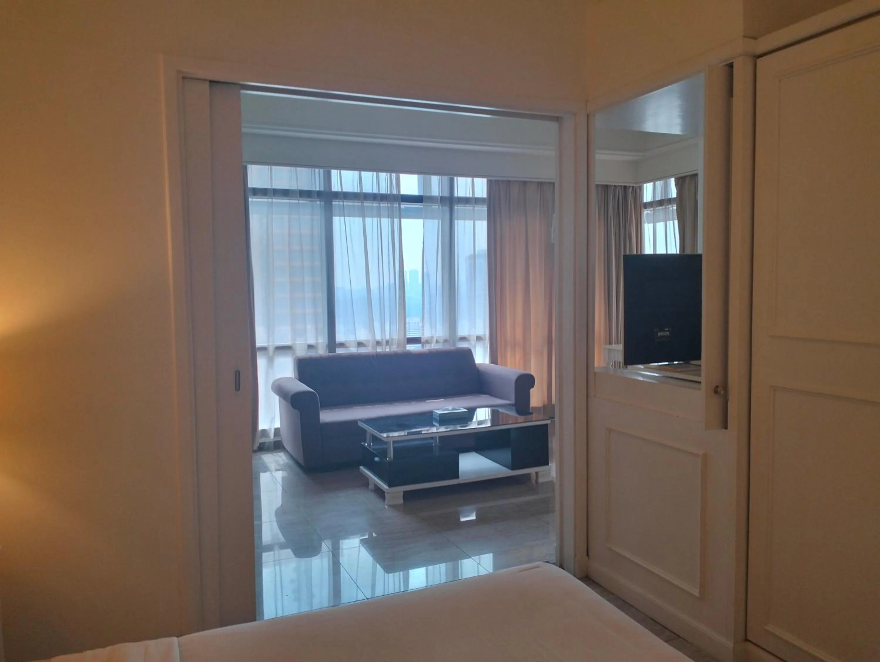 Communal lounge/ TV room in Luxy Service Apartment at Times Square KL