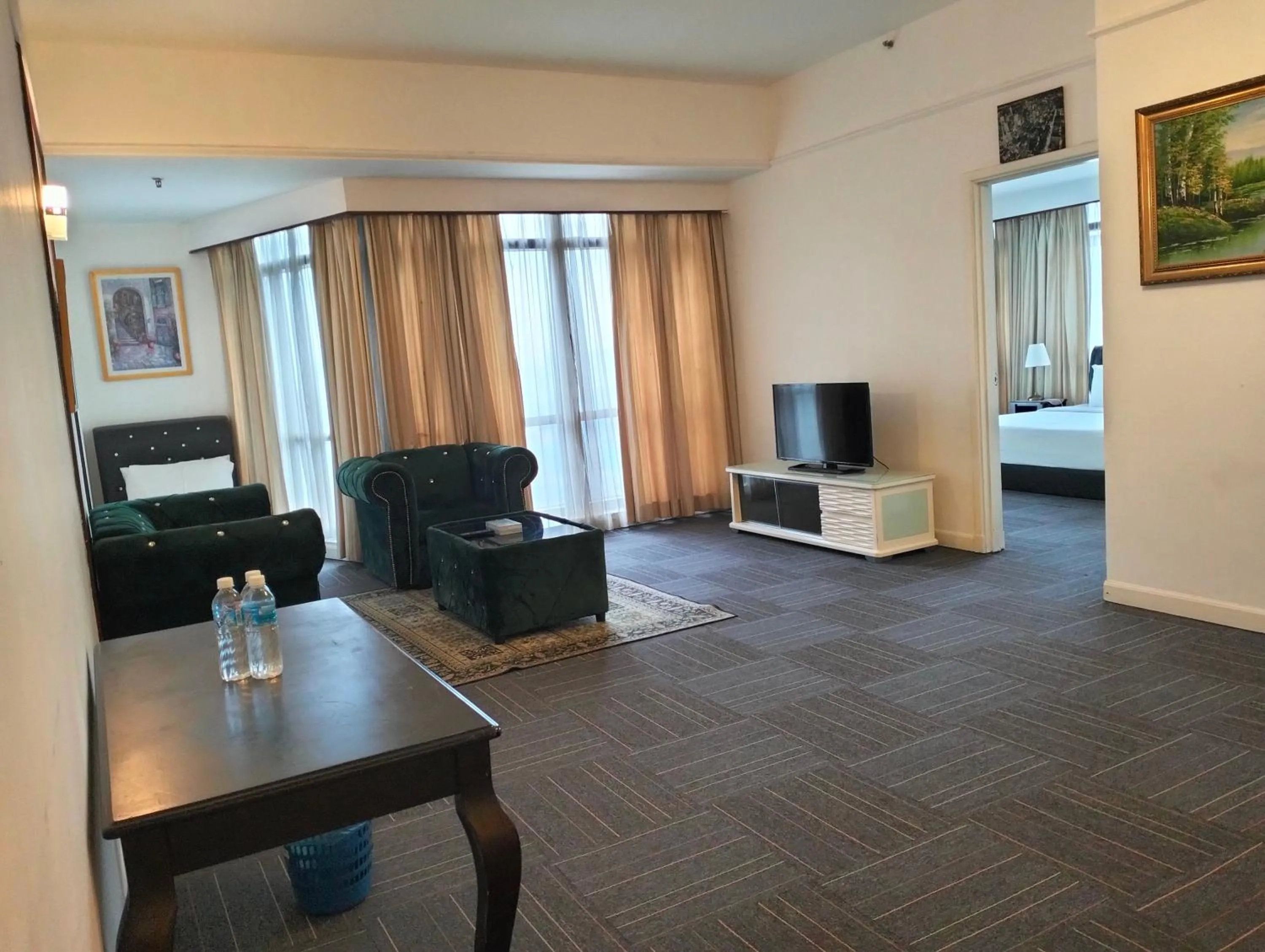 Communal lounge/ TV room in Luxy Service Apartment at Times Square KL