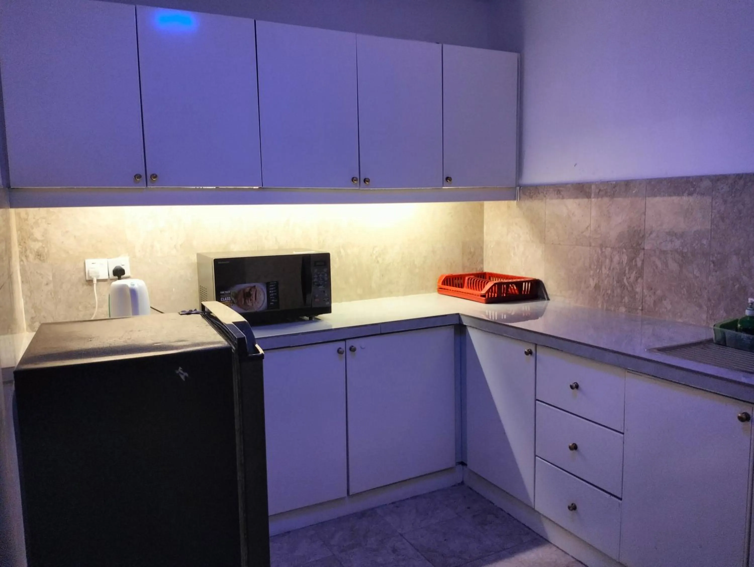 Kitchen or kitchenette in Luxy Service Apartment at Times Square KL