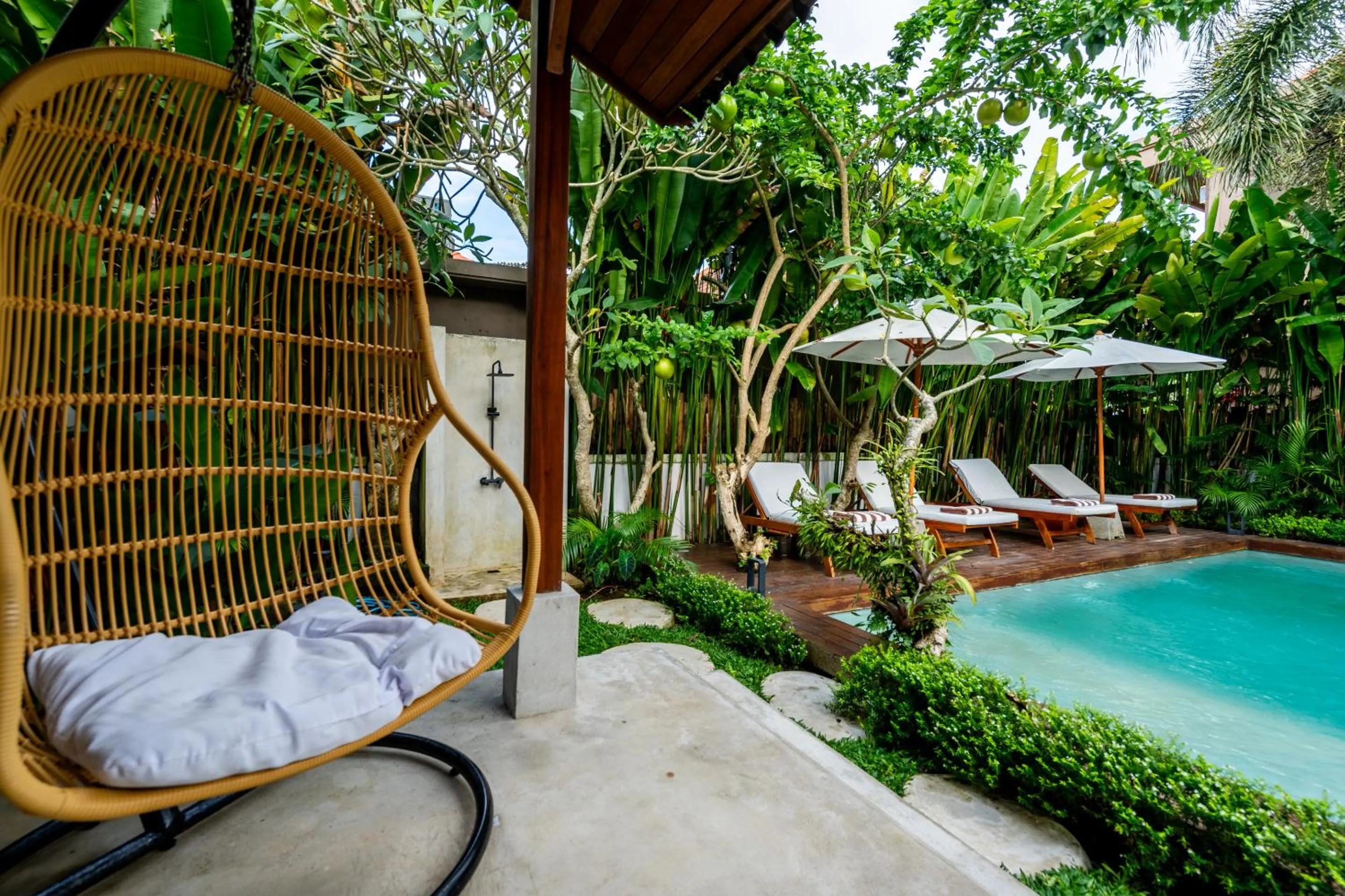 Garden in Hijau Villa by EVDEkimi - Charming 2BR escape with Pool, Outdoor Lounge, Lush Garden - New Year's Offer