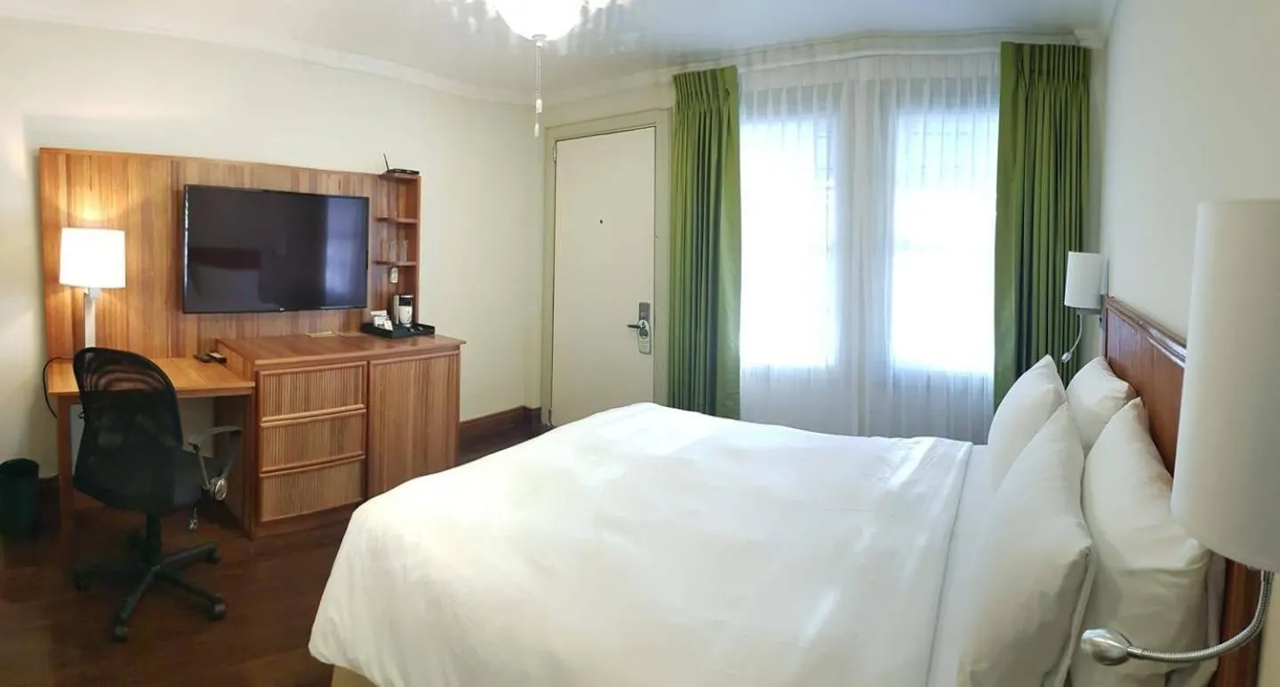 Bedroom, Bed in Cara Lodge Hotel