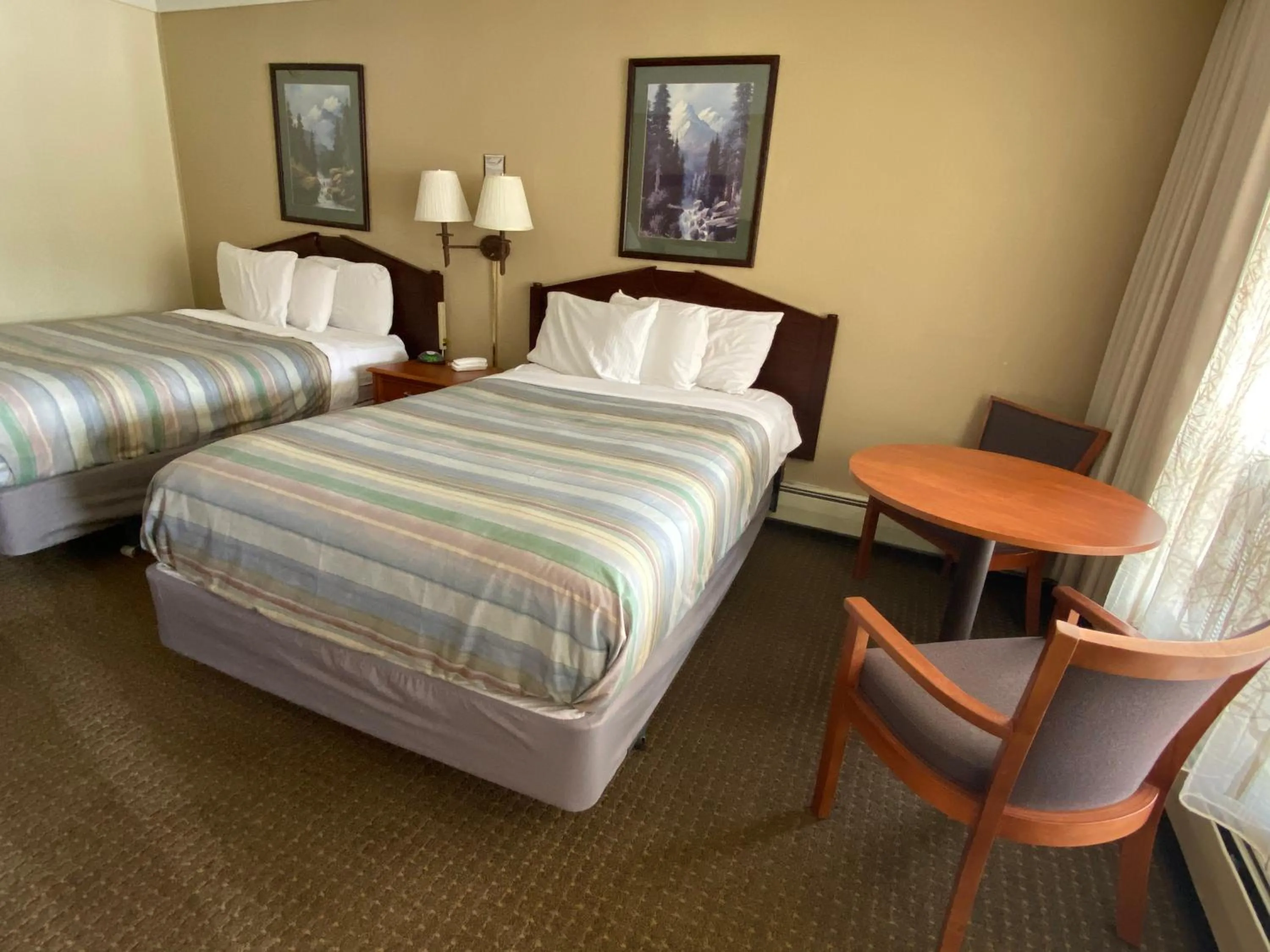 Bed in Snowshoe Motel