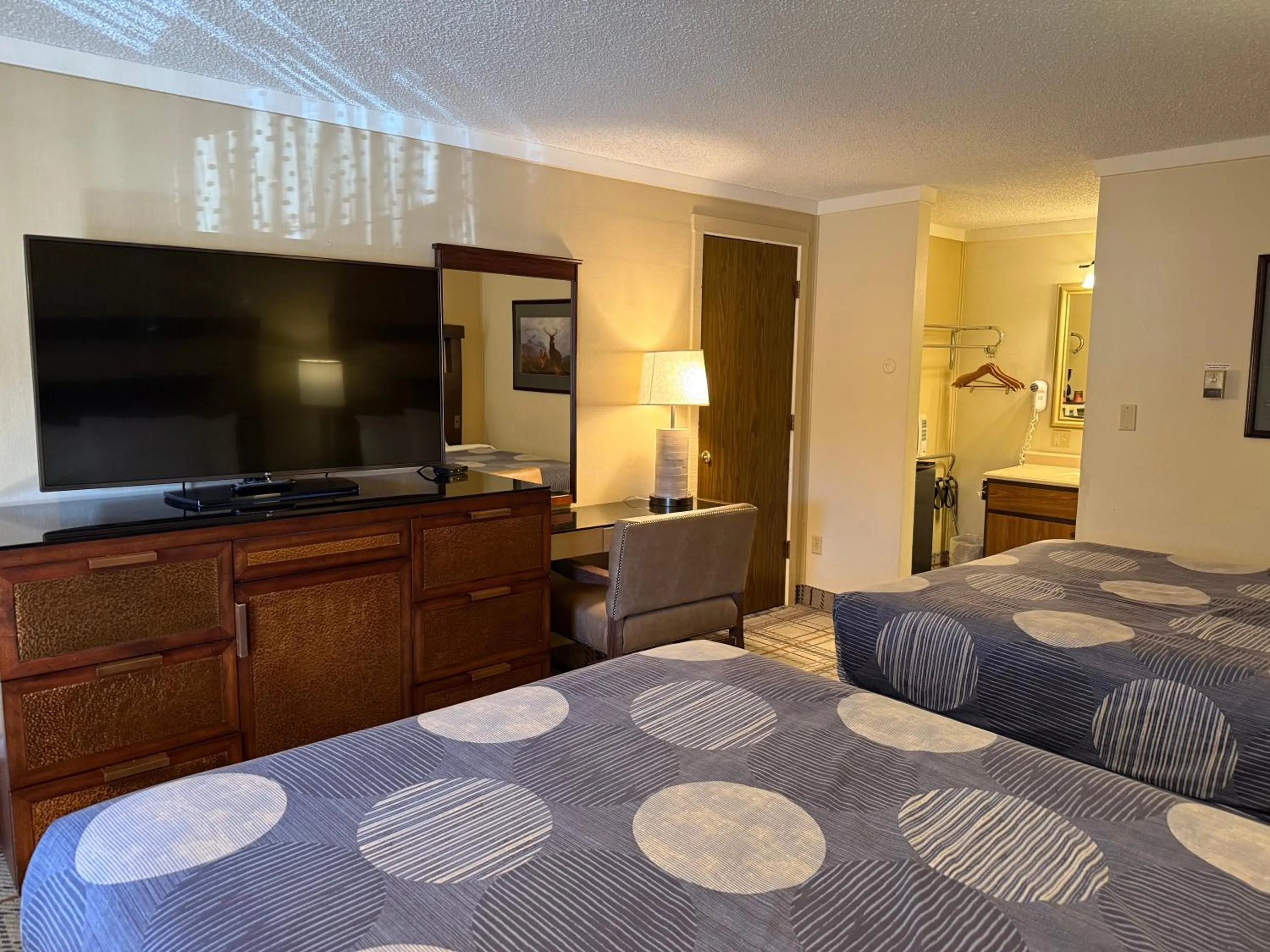 Bed in Snowshoe Motel