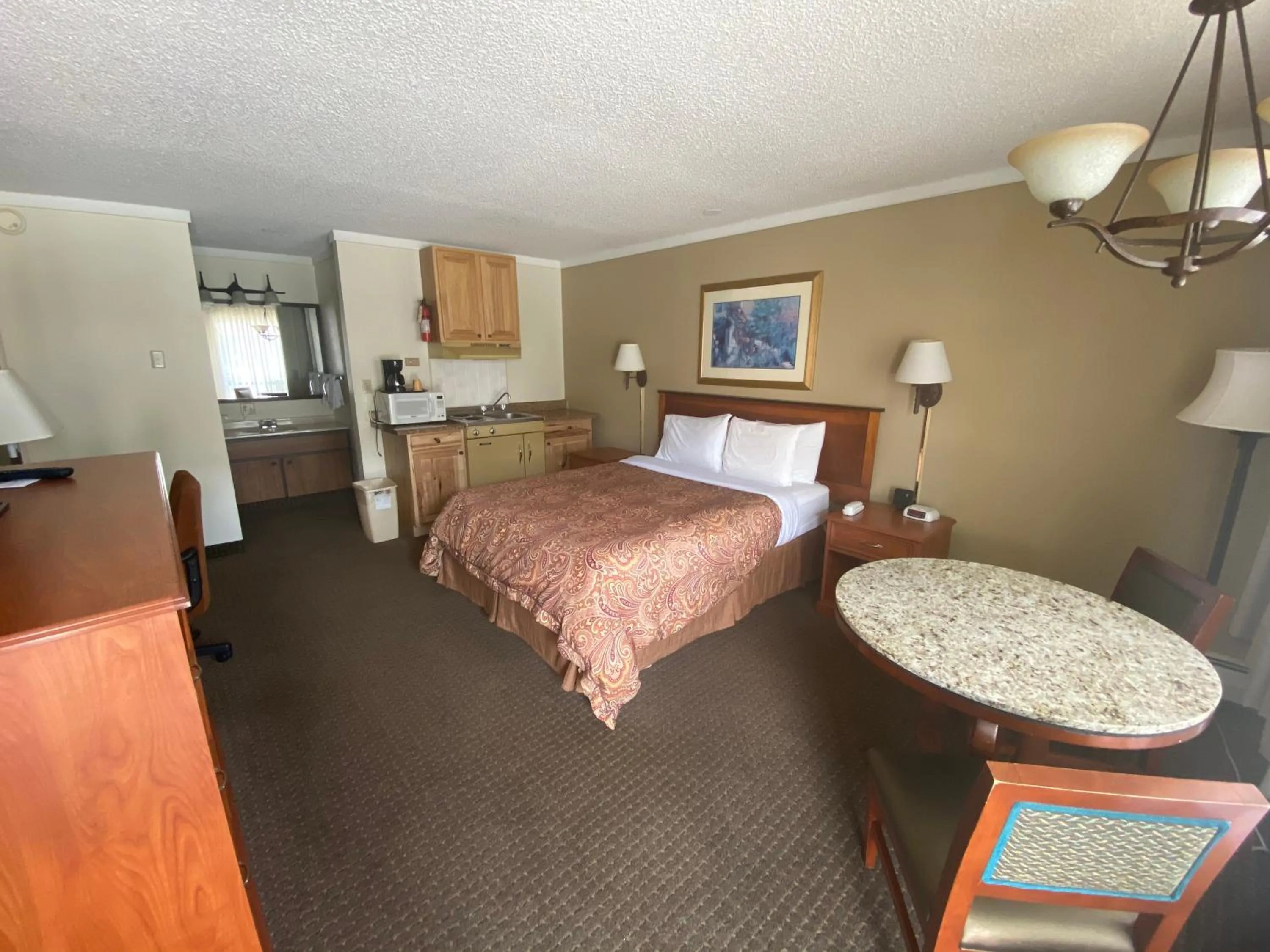 Bed in Snowshoe Motel