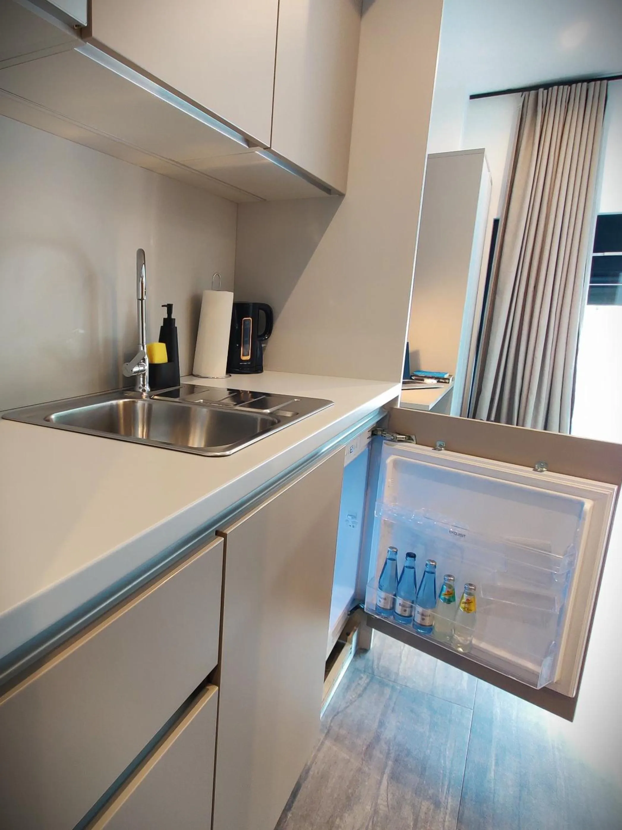 kitchen in NOVERA Aparthotel