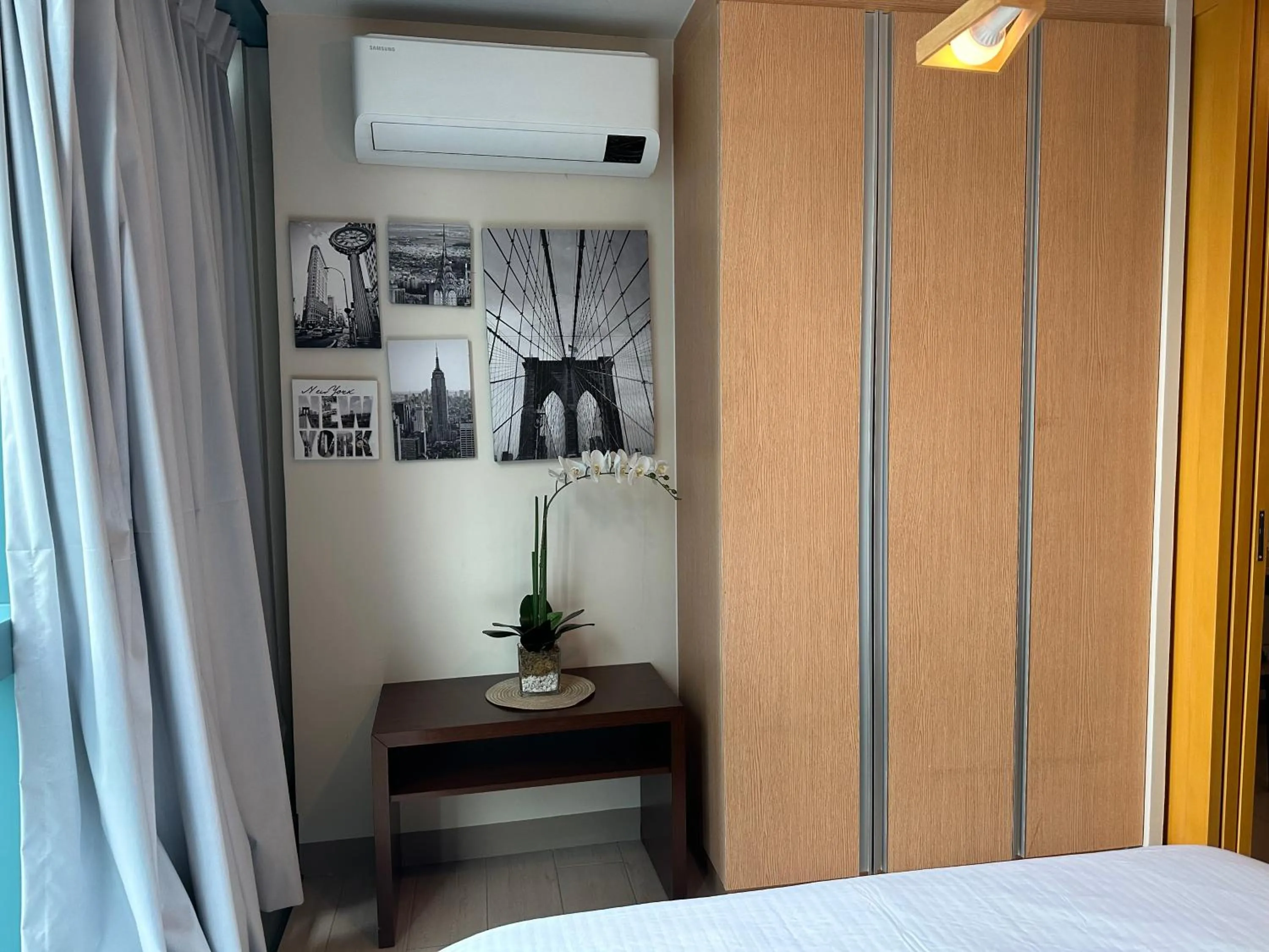 wardrobe, Bed in Executive Suite in Bonifacio Global City