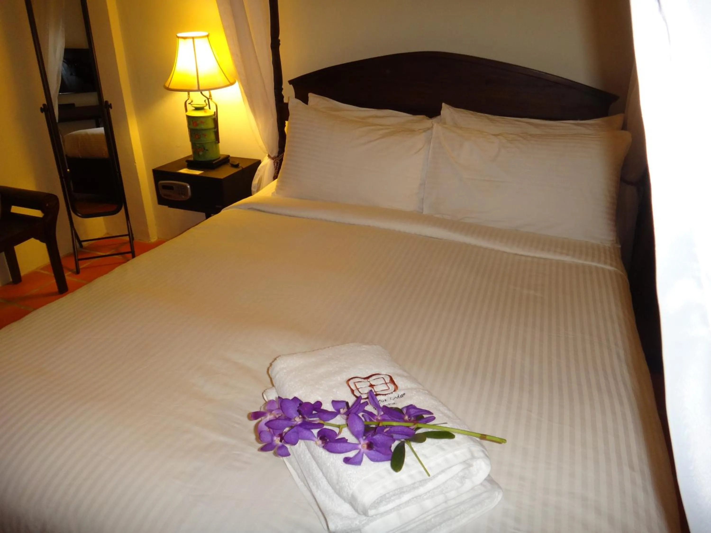 Photo of the whole room, Bed in Betel Nut Lodge