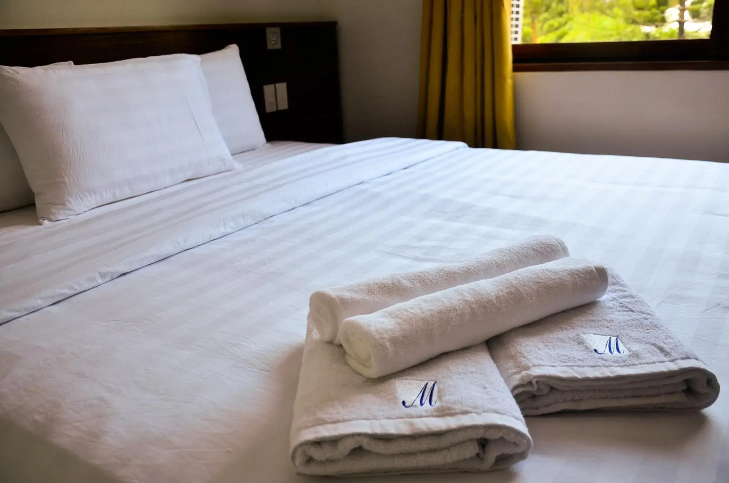 Bed in Marianne Hotel Bed in Marianne Hotel