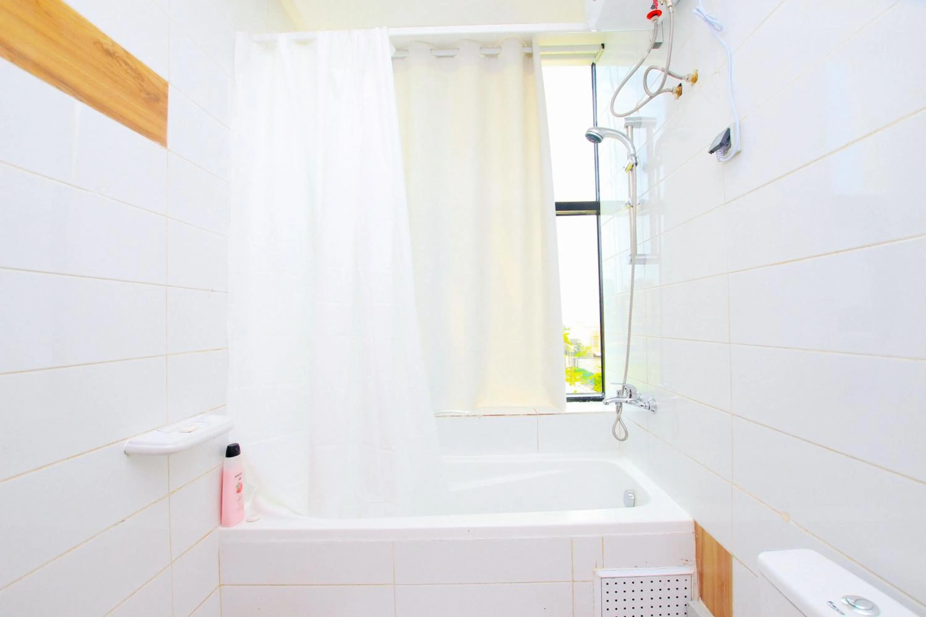 Bathroom in Appart Hotel Les orchidees