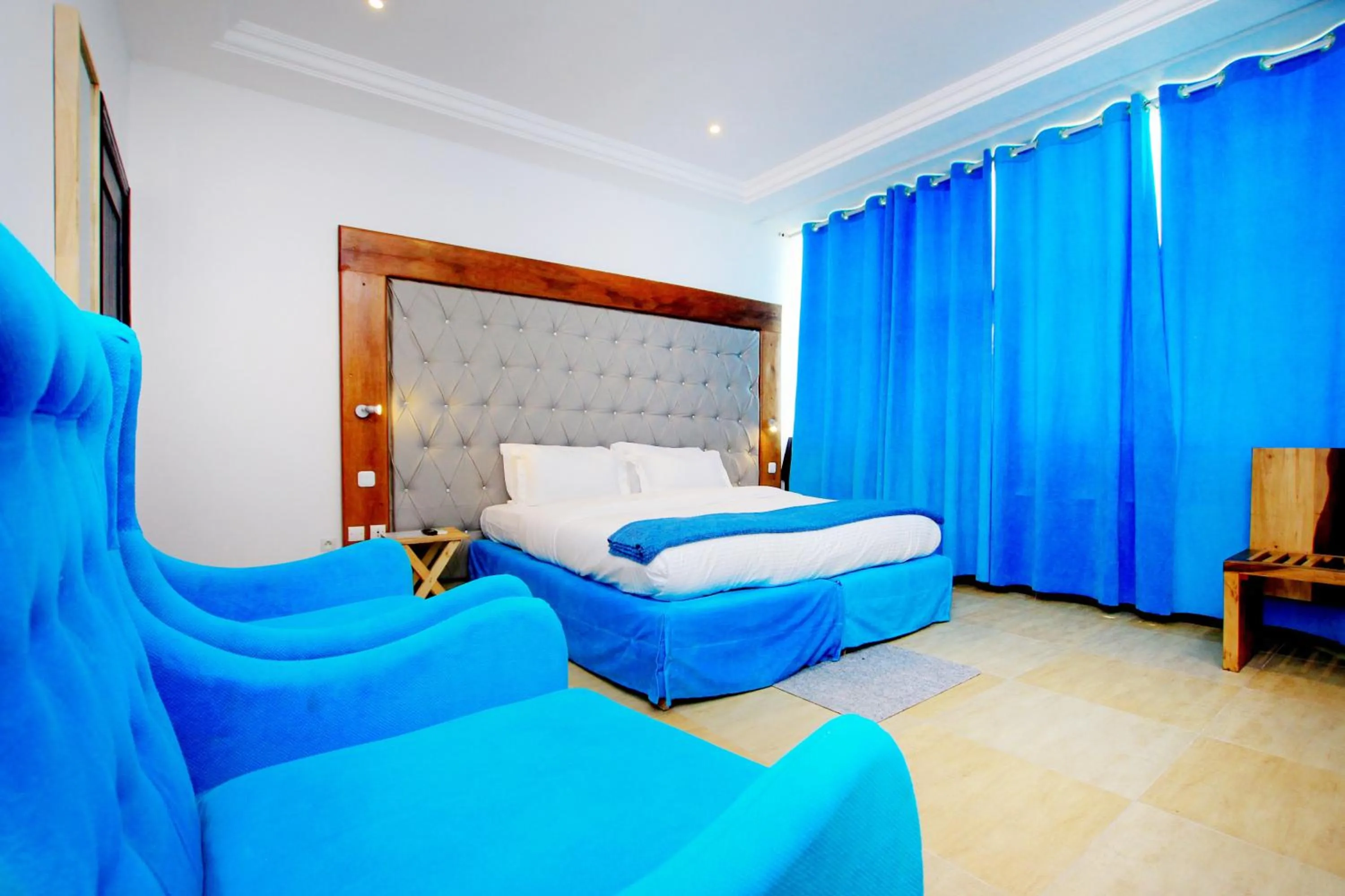Bed in Appart Hotel Les orchidees