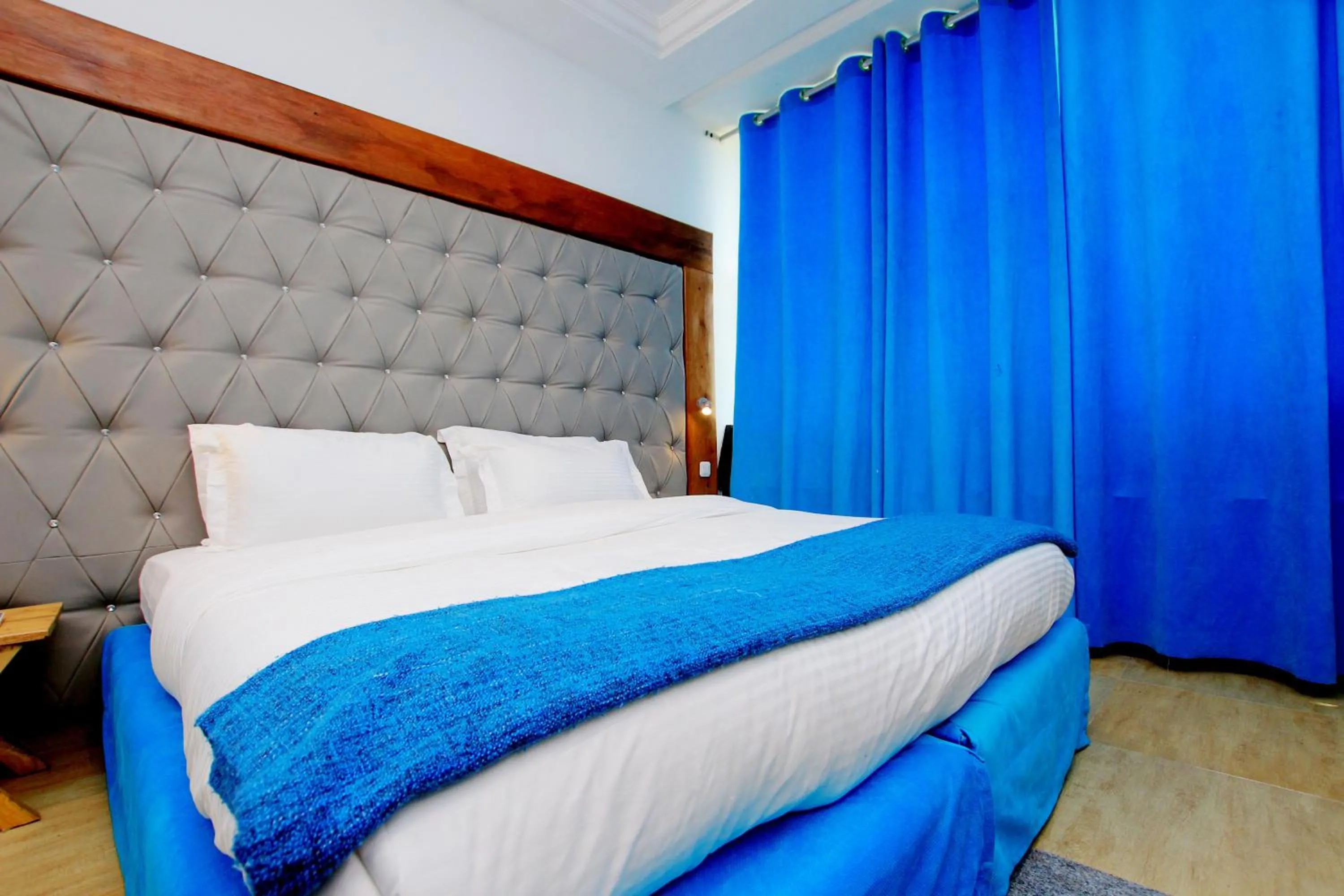Bed in Appart Hotel Les orchidees