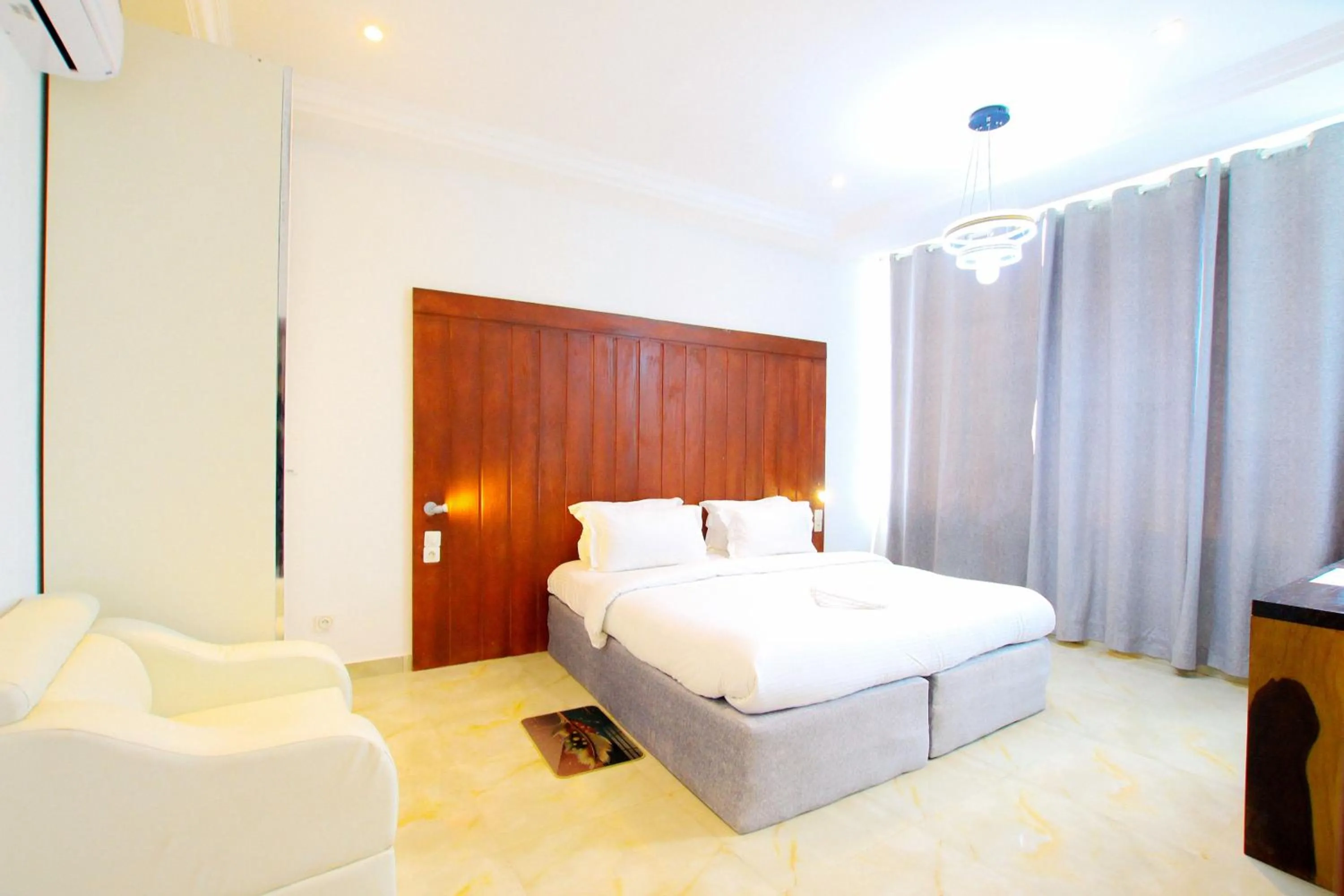 Bed in Appart Hotel Les orchidees
