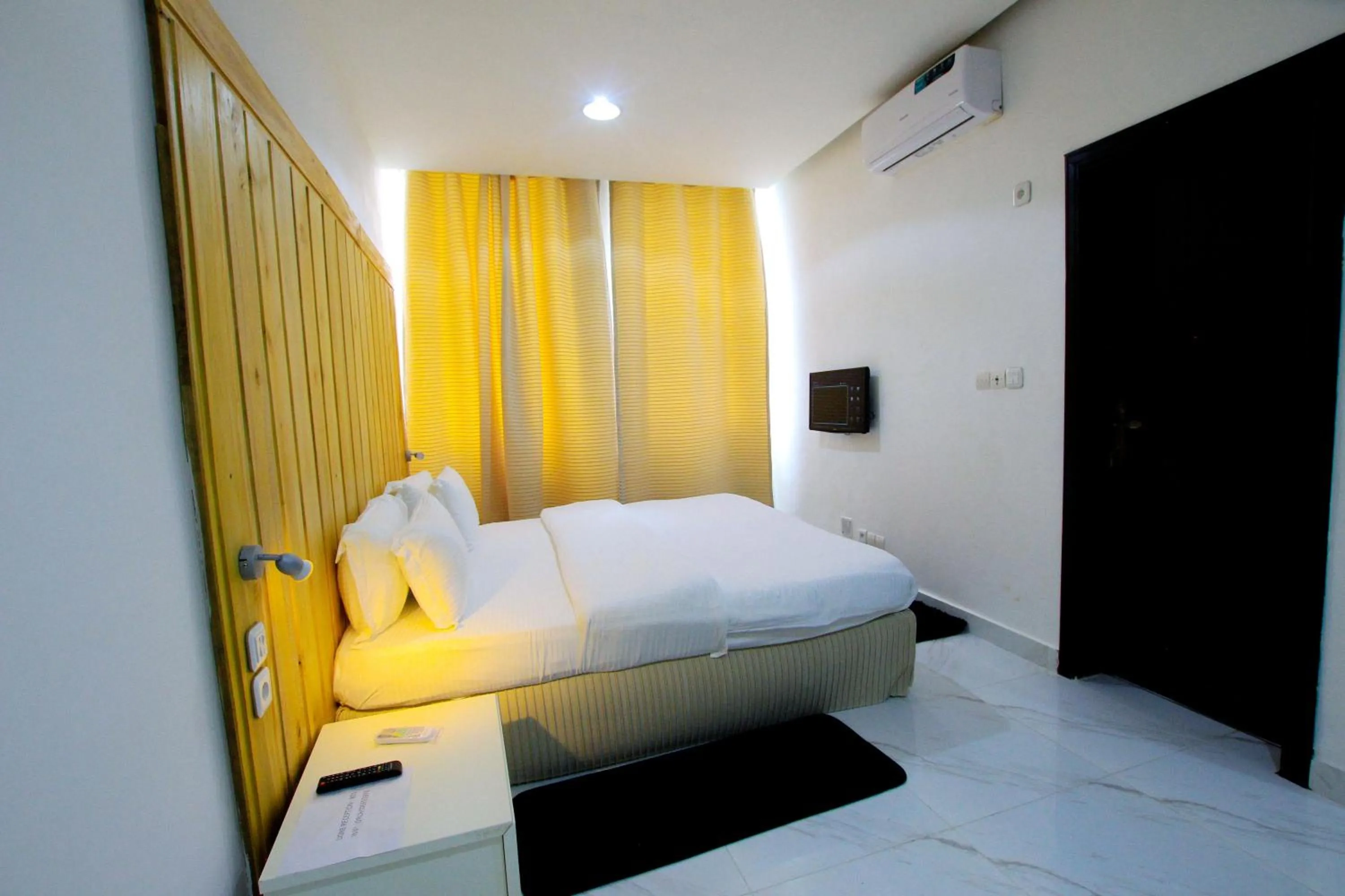 Bed in Appart Hotel Les orchidees