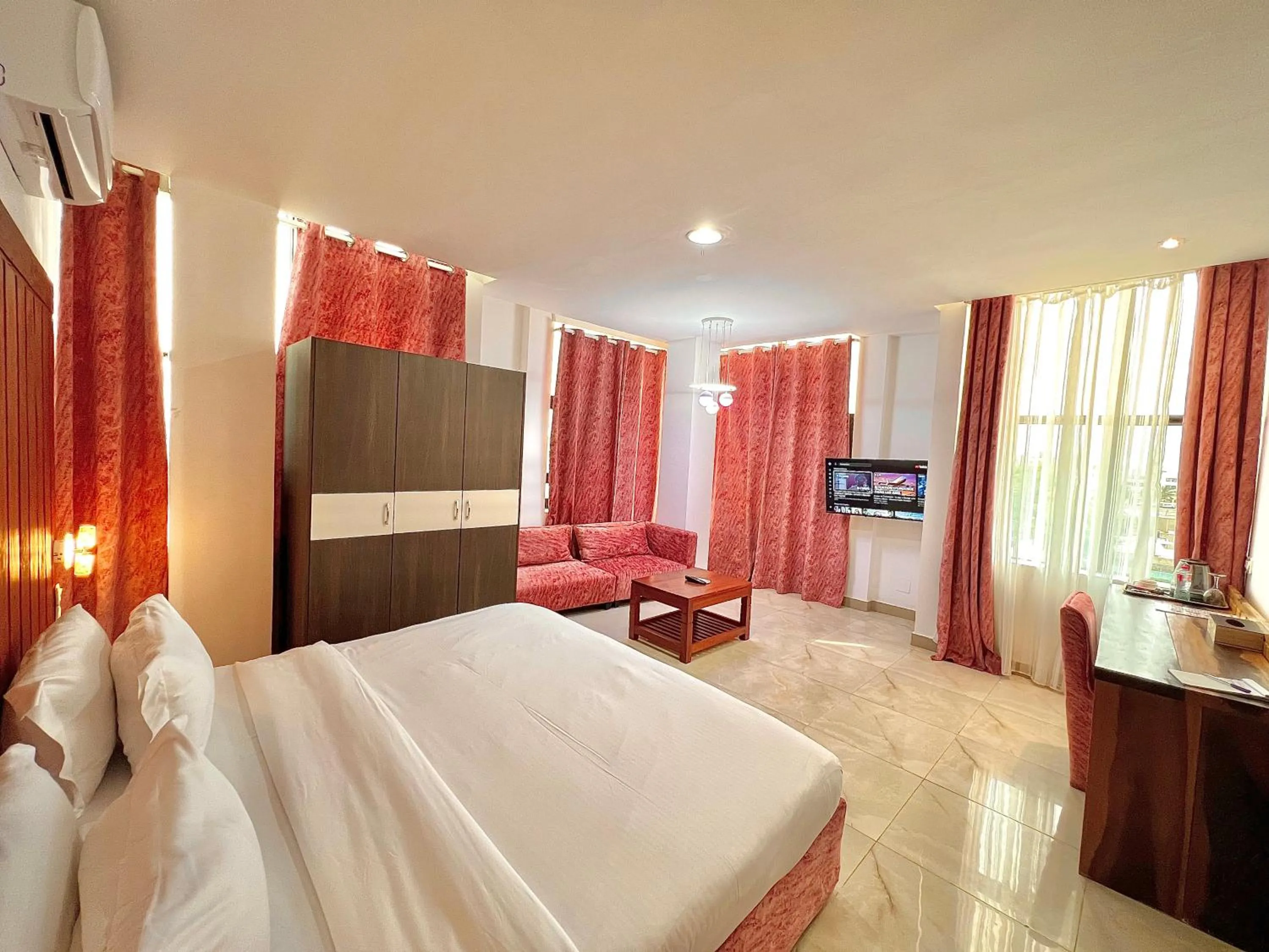 Photo of the whole room, Bed in Appart Hotel Les orchidees