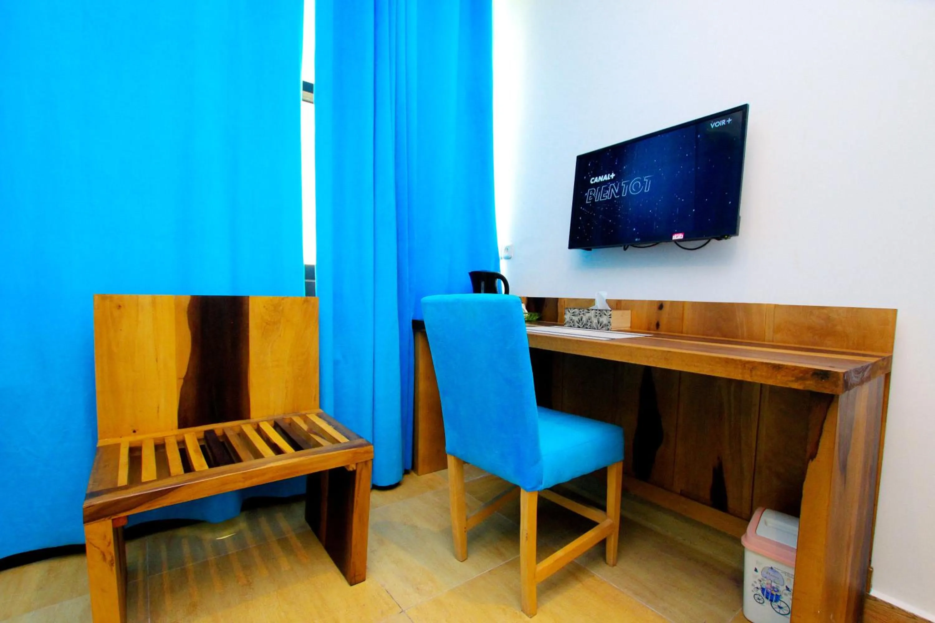 Photo of the whole room in Appart Hotel Les orchidees