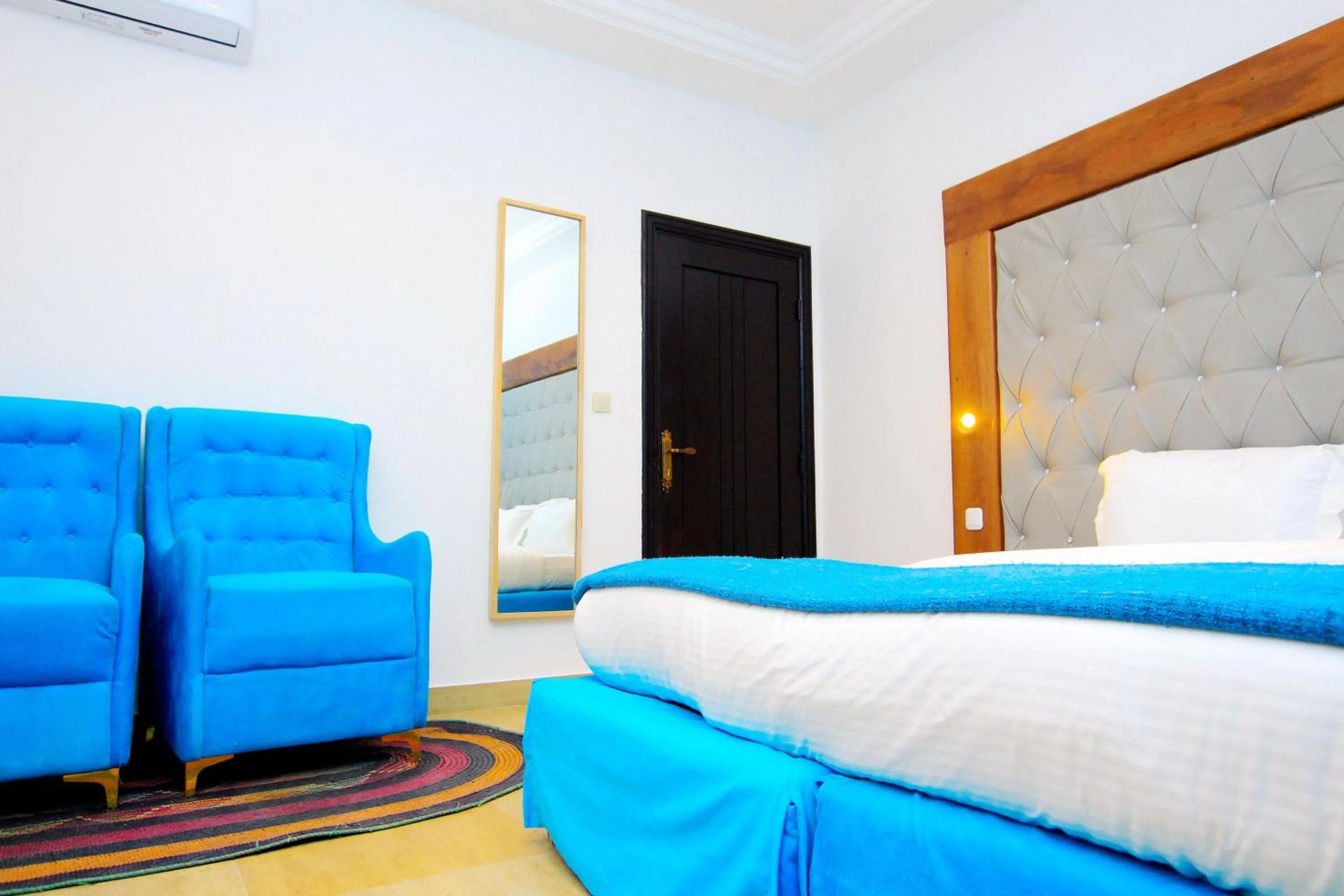 Bedroom, Bed in Appart Hotel Les orchidees