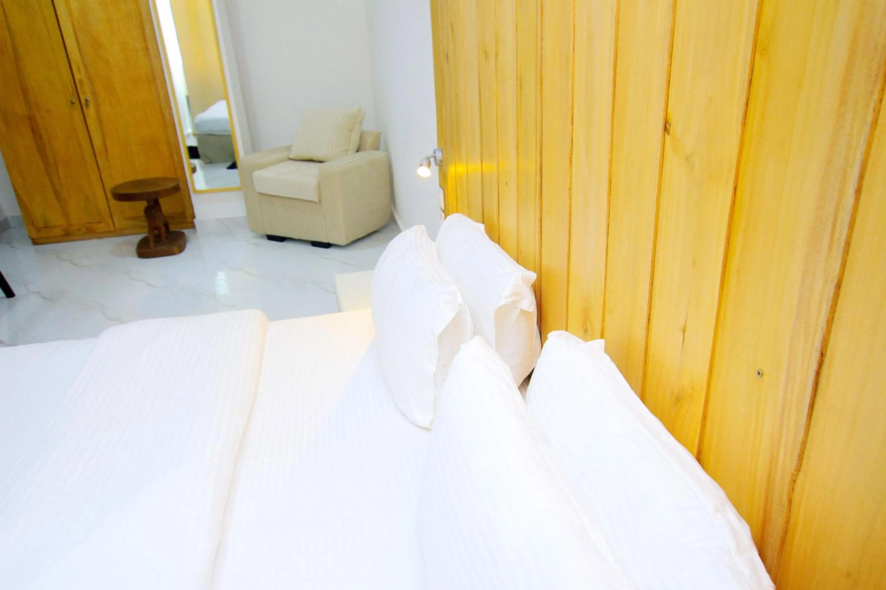 Bed in Appart Hotel Les orchidees