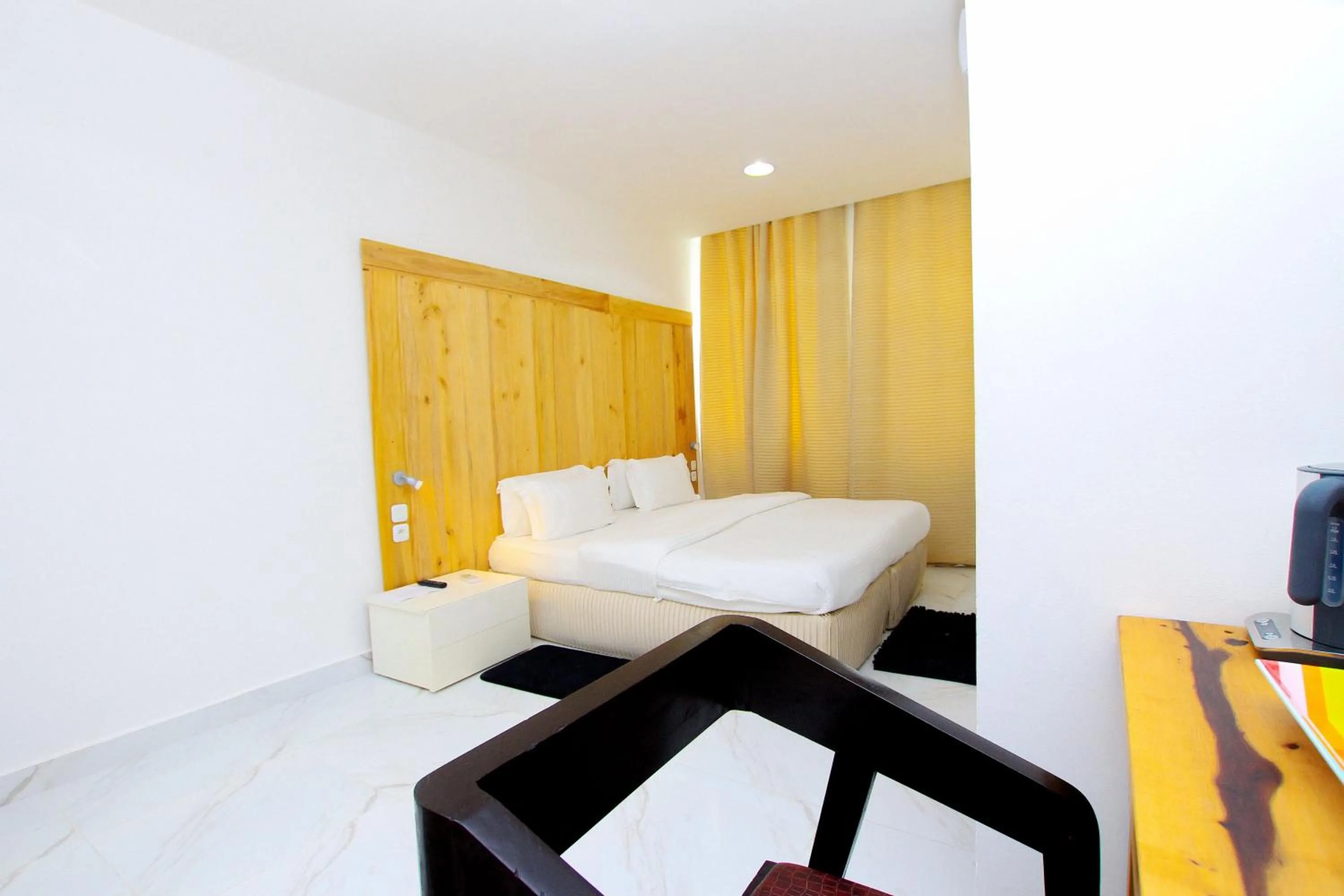 Bed in Appart Hotel Les orchidees