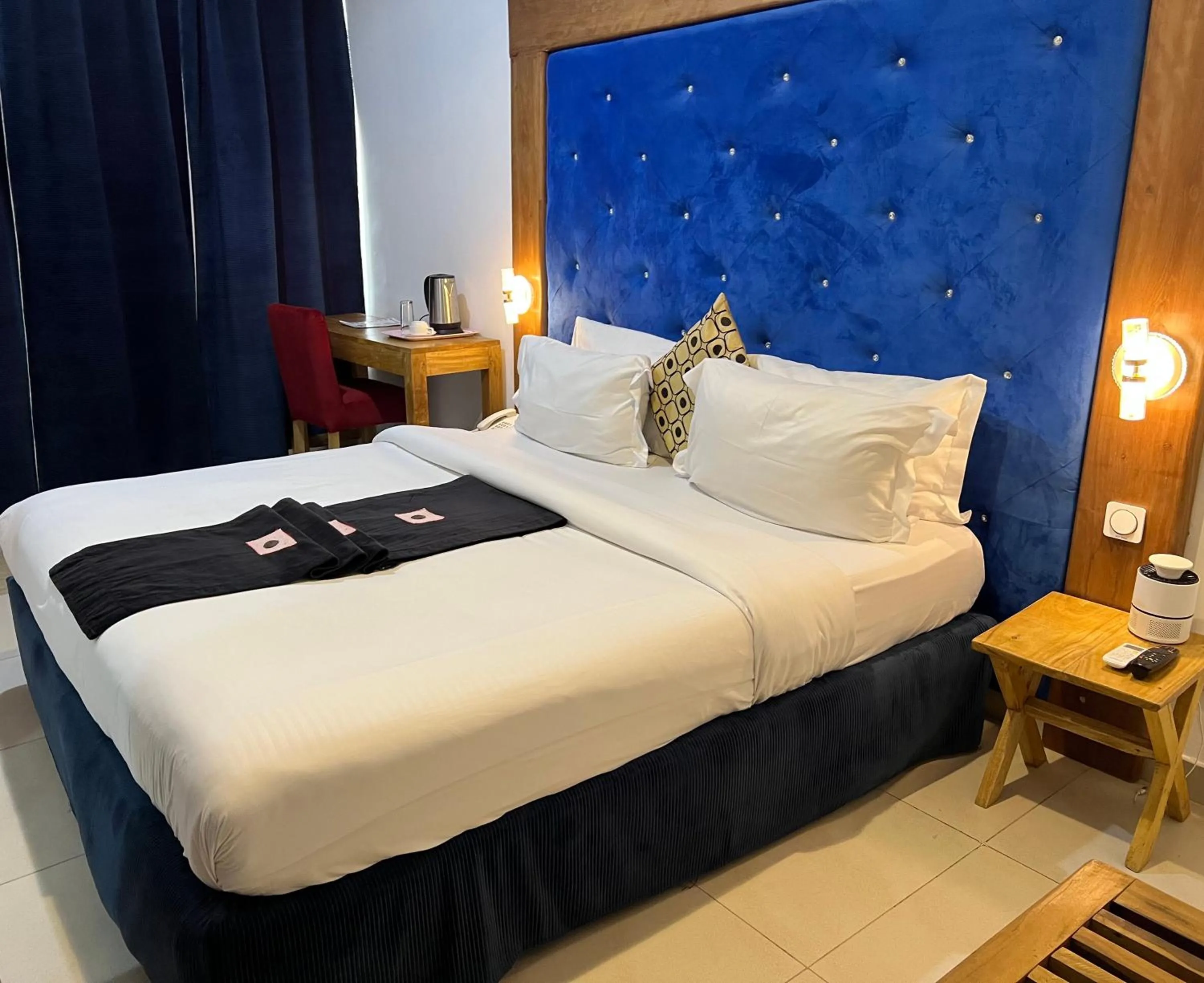 Bed in Appart Hotel Les orchidees