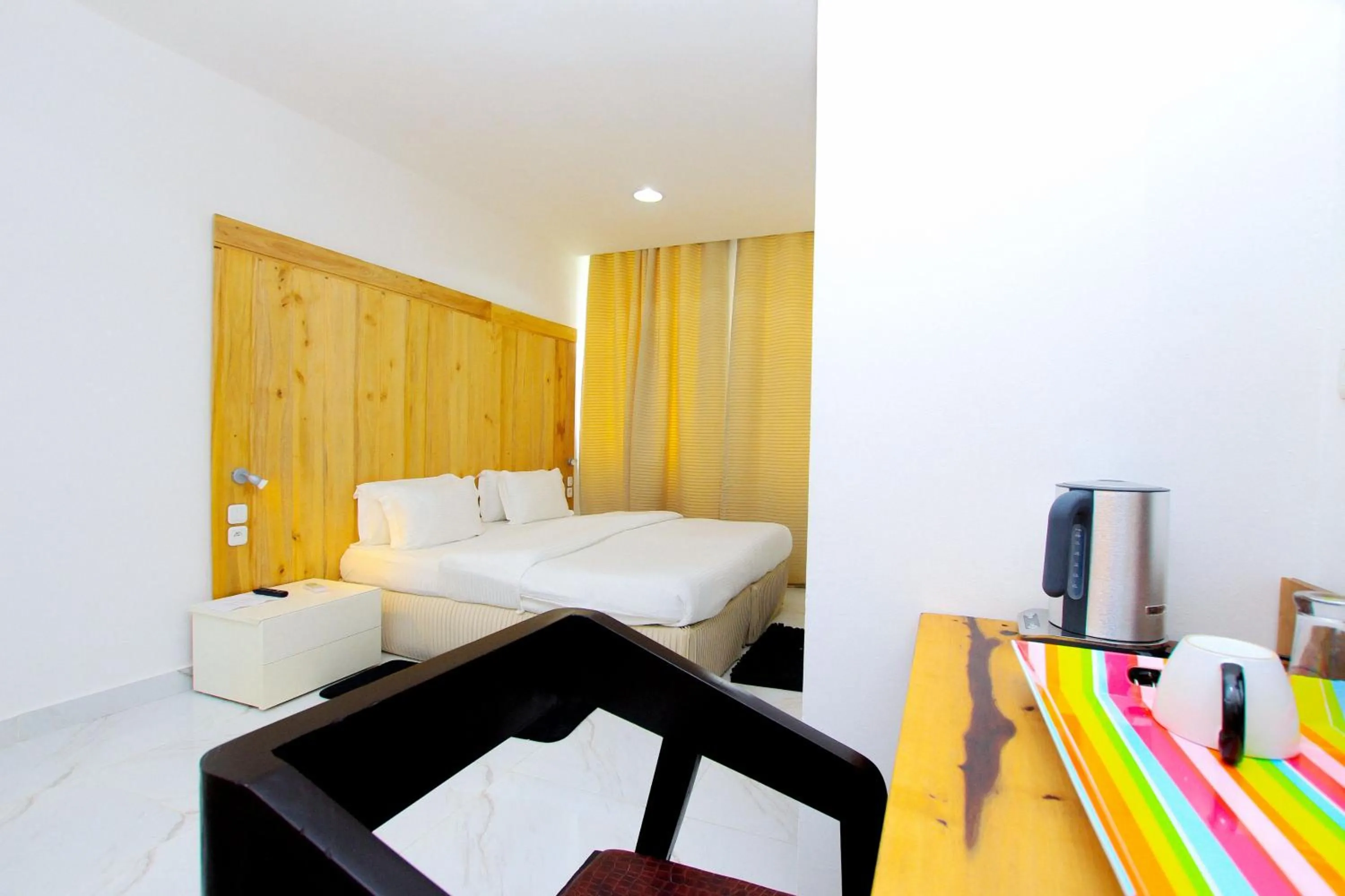 Bed in Appart Hotel Les orchidees