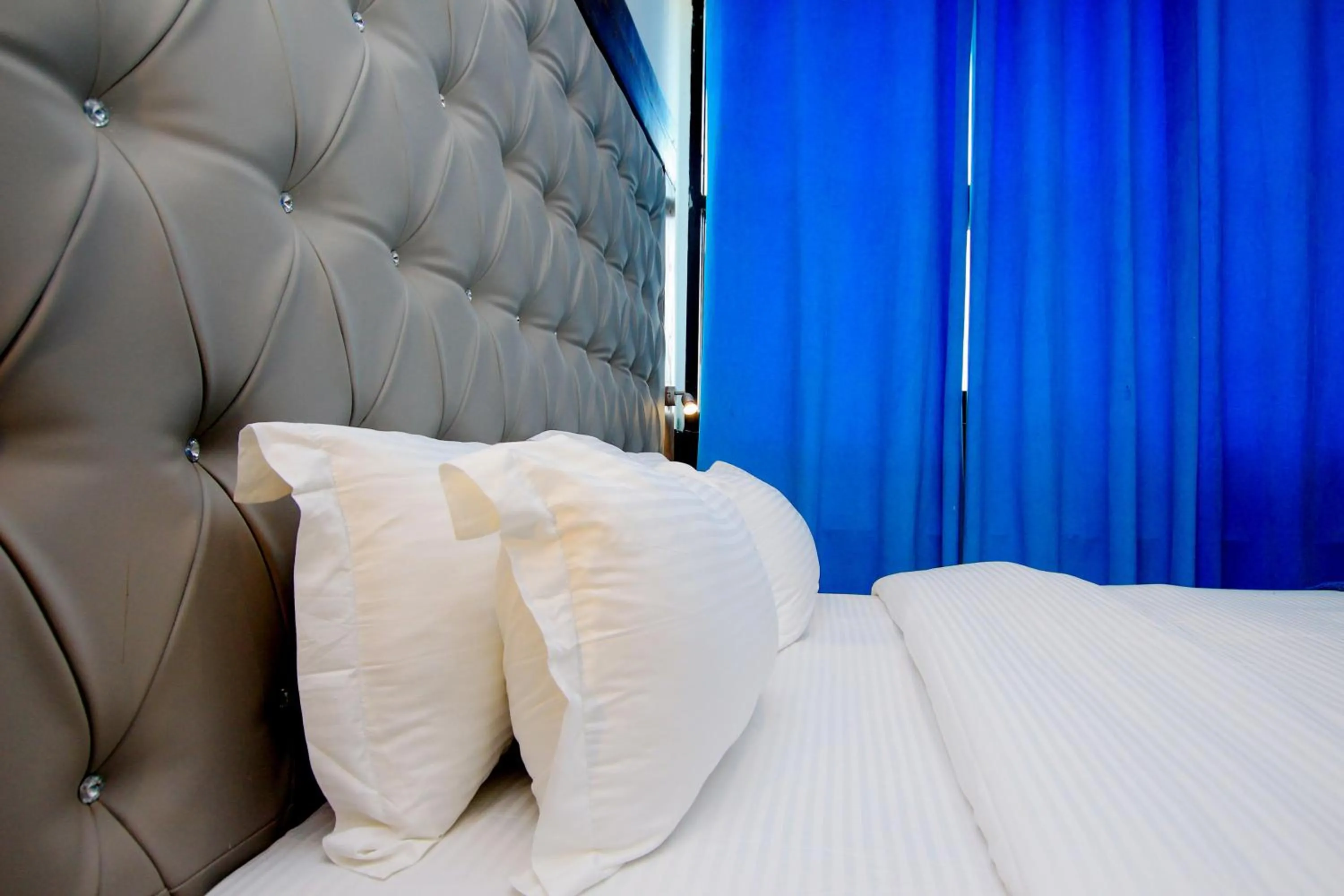 Bed in Appart Hotel Les orchidees