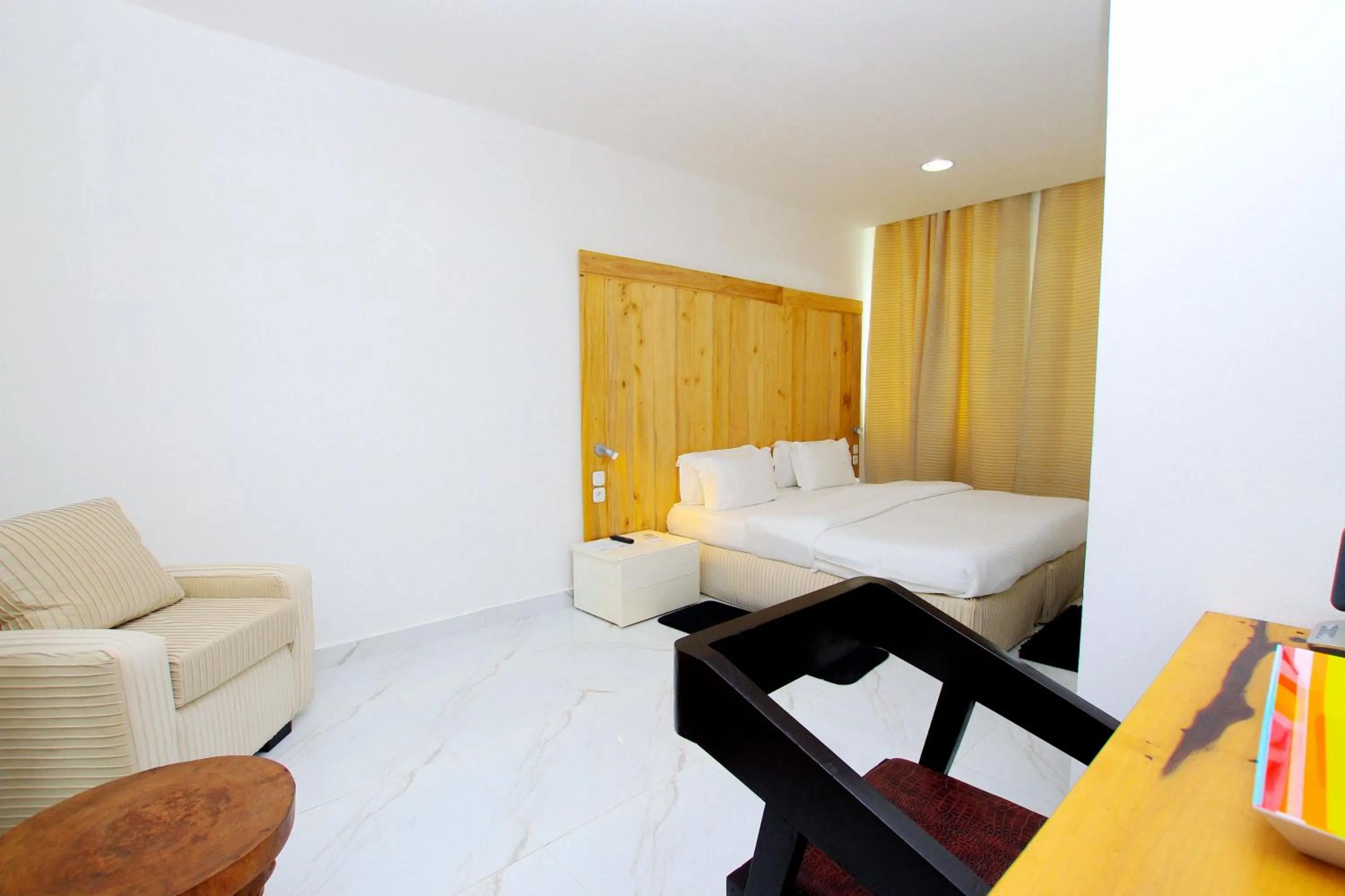 Bed in Appart Hotel Les orchidees