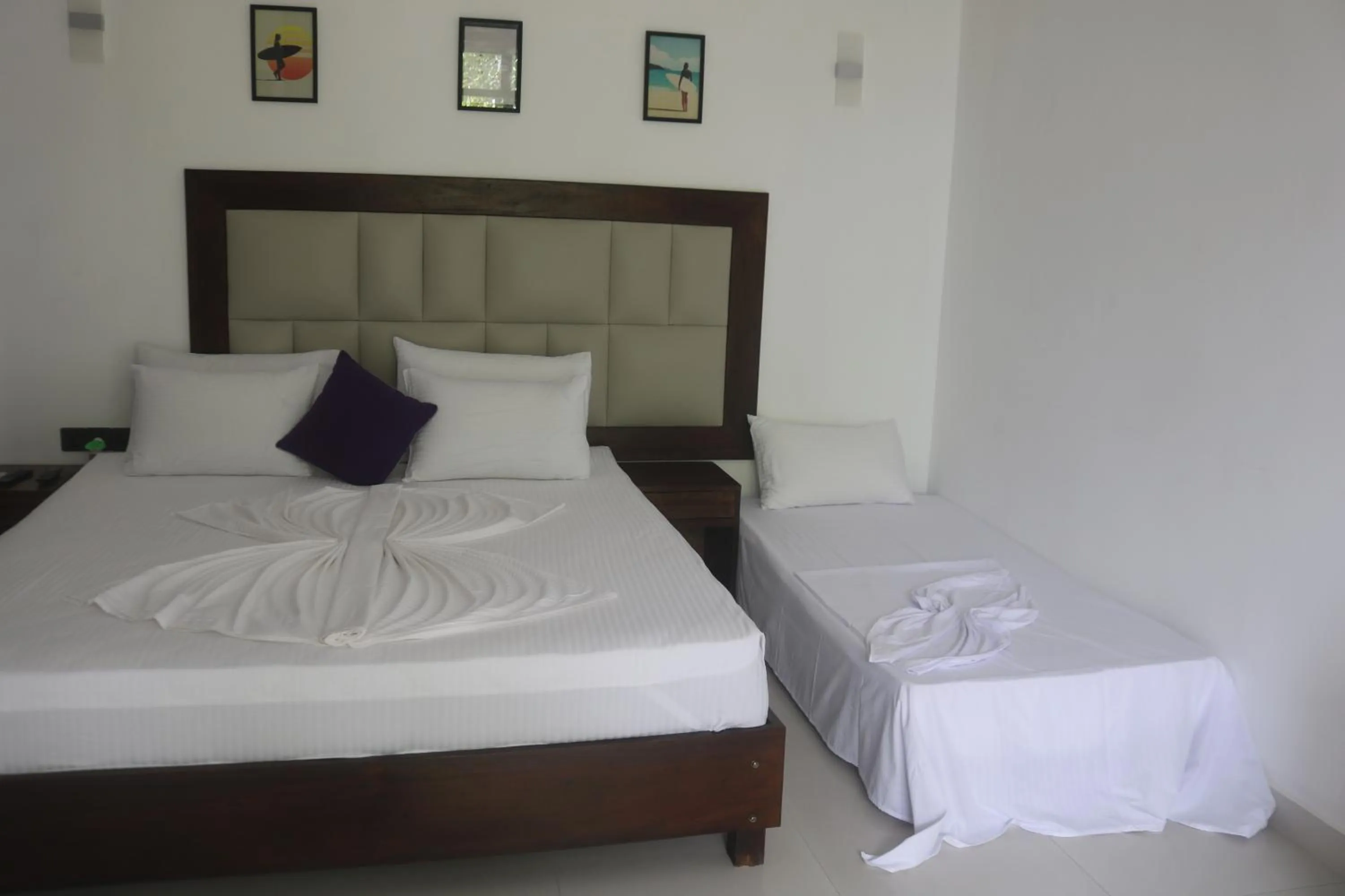 Bed in Mzion Hotel Weligama