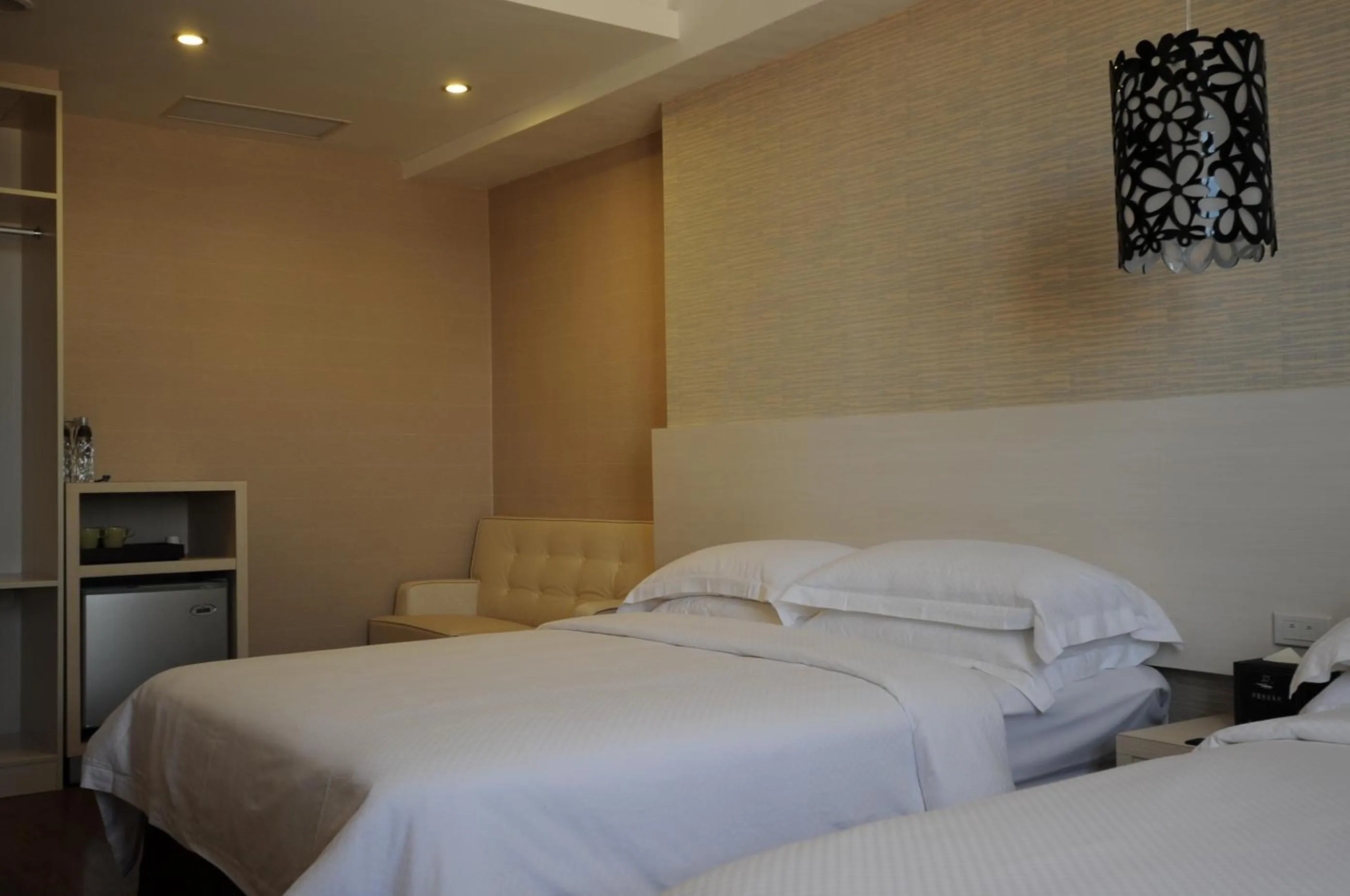 Photo of the whole room, Bed in The Riverside Hotel Hengchun