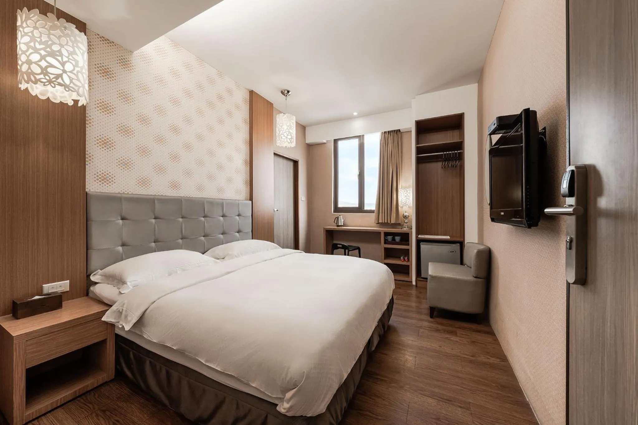 Bed in The Riverside Hotel Hengchun