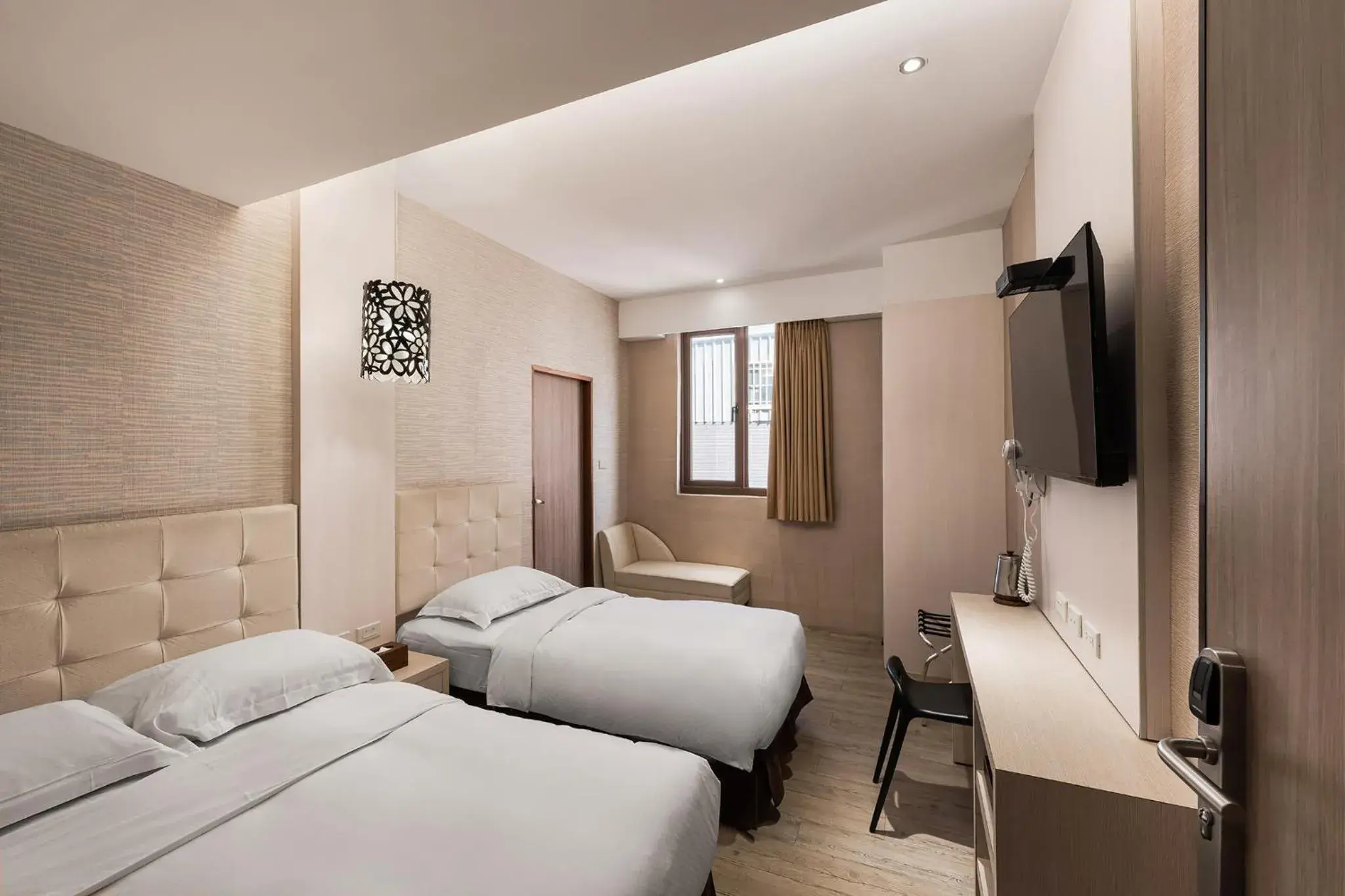 Bed in The Riverside Hotel Hengchun Bed in The Riverside Hotel Hengchun