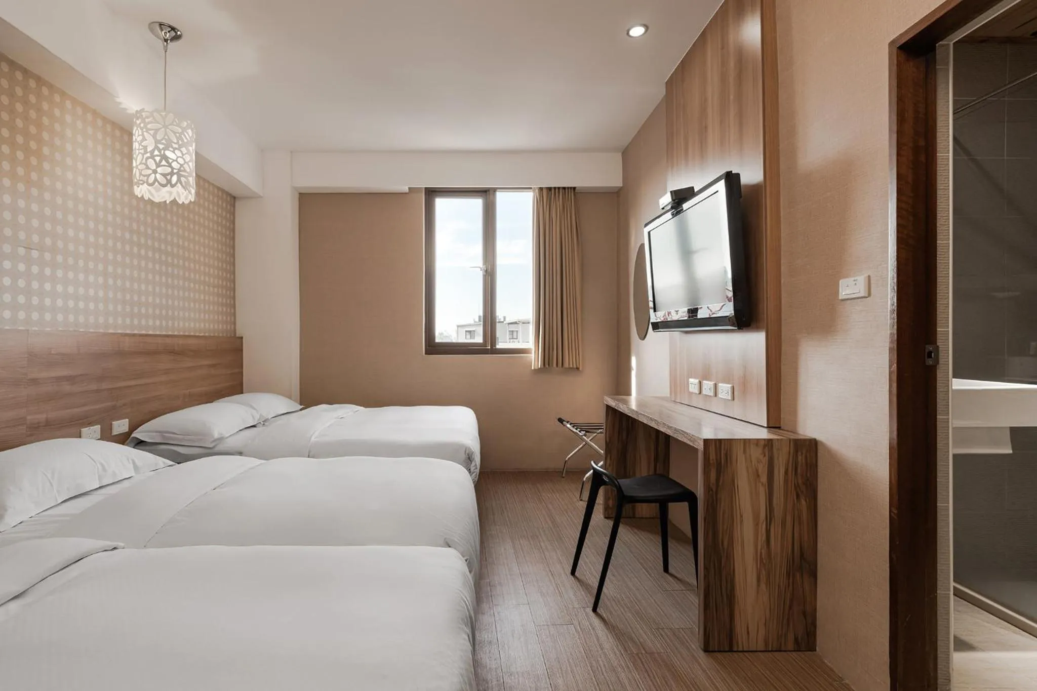 Photo of the whole room, Bed in The Riverside Hotel Hengchun