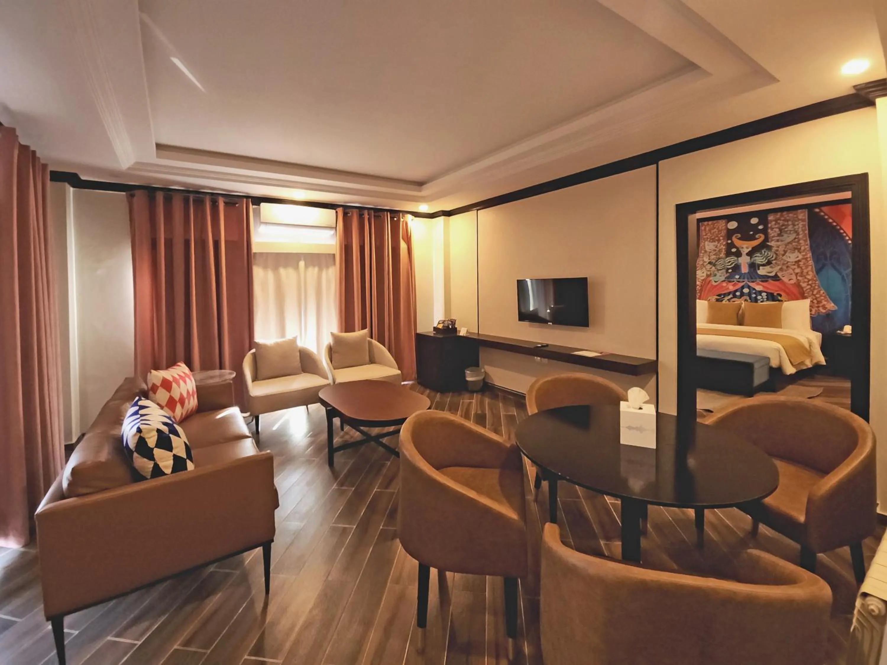 Living room in The Vibe By Ambiance