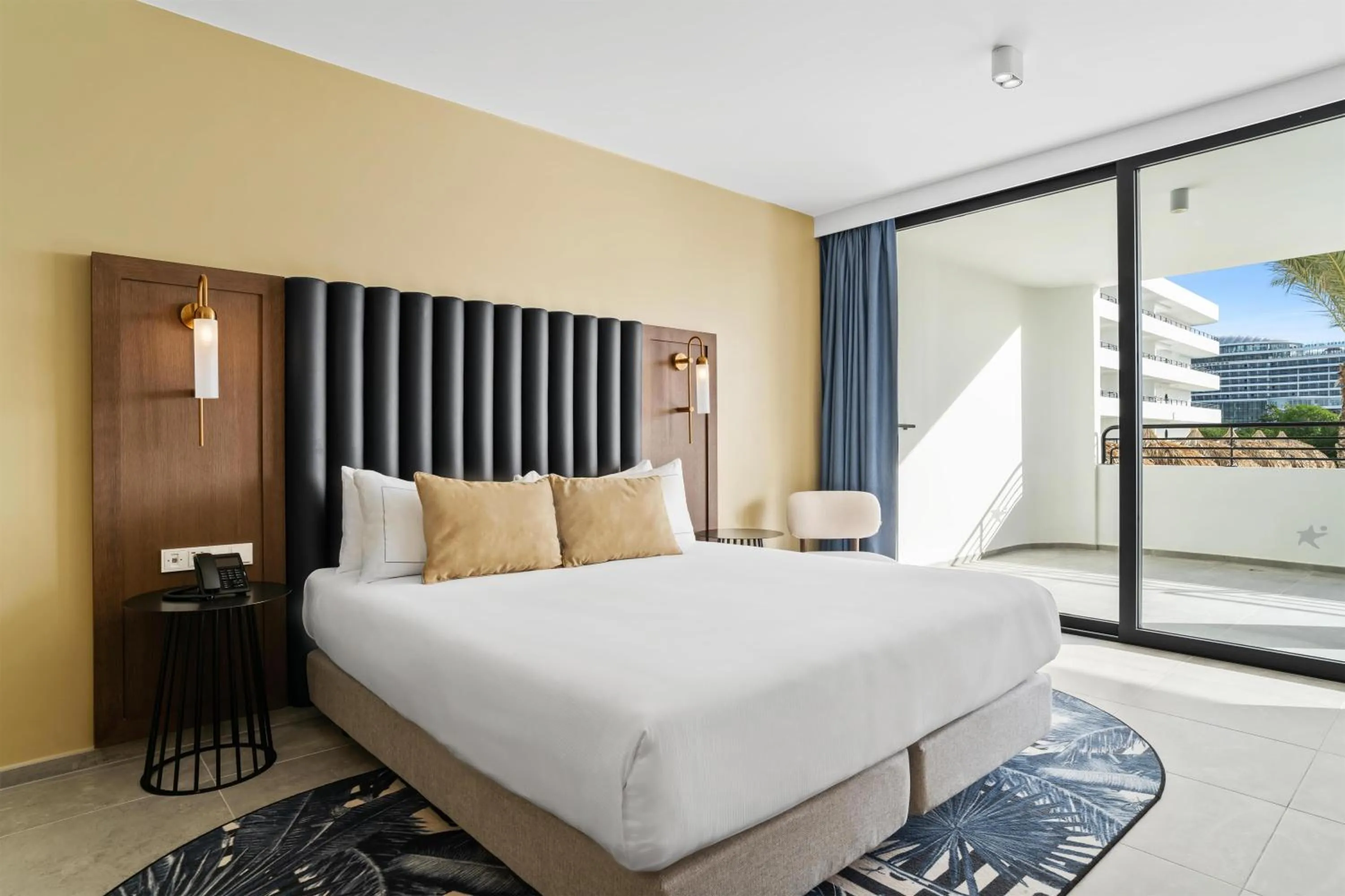 Bed in The Rif At Mangrove Beach Corendon Curacao All-Inclusive, Curio by Hilton