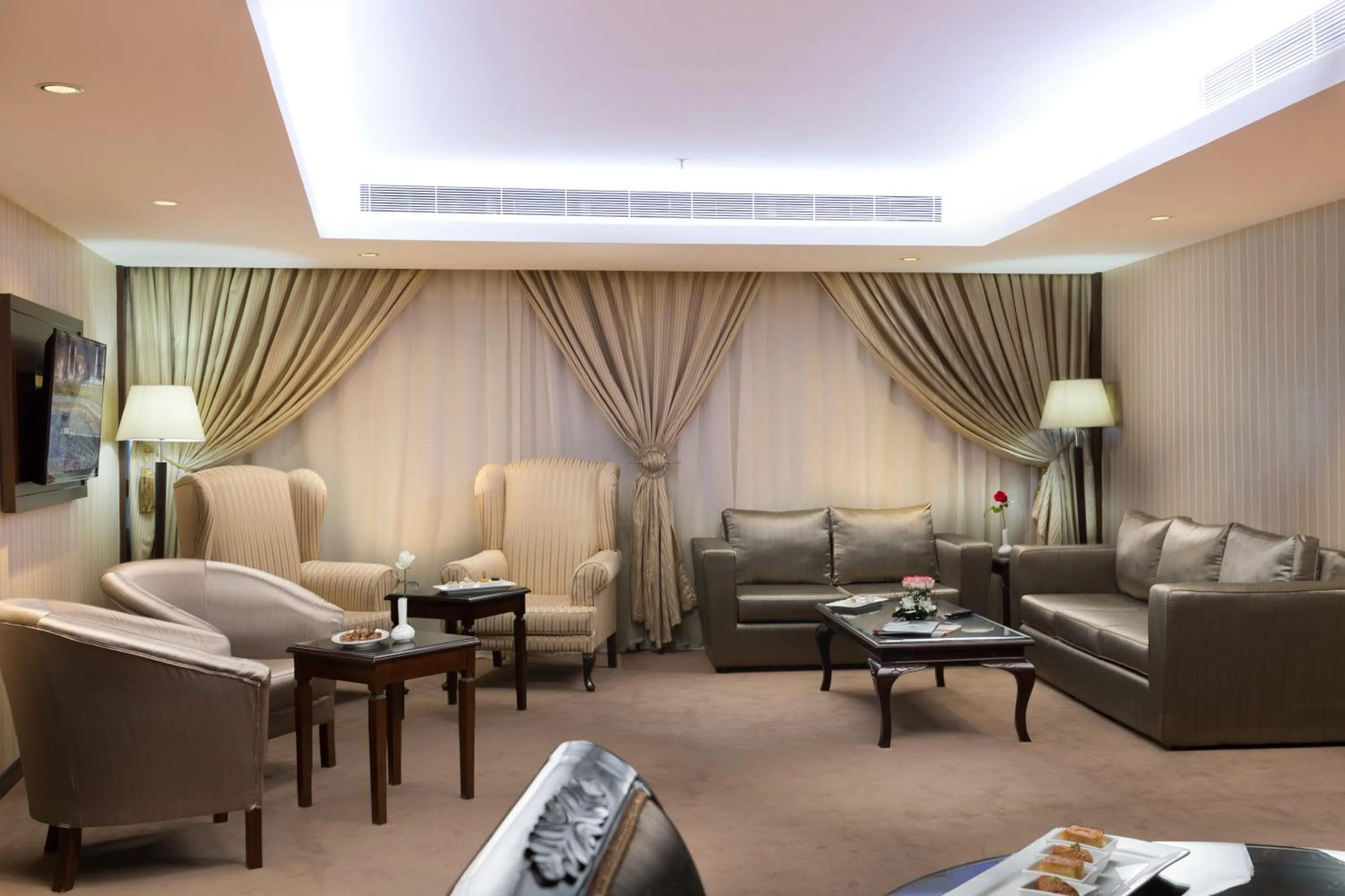 Living room in Razana Al Rawdha Hotel