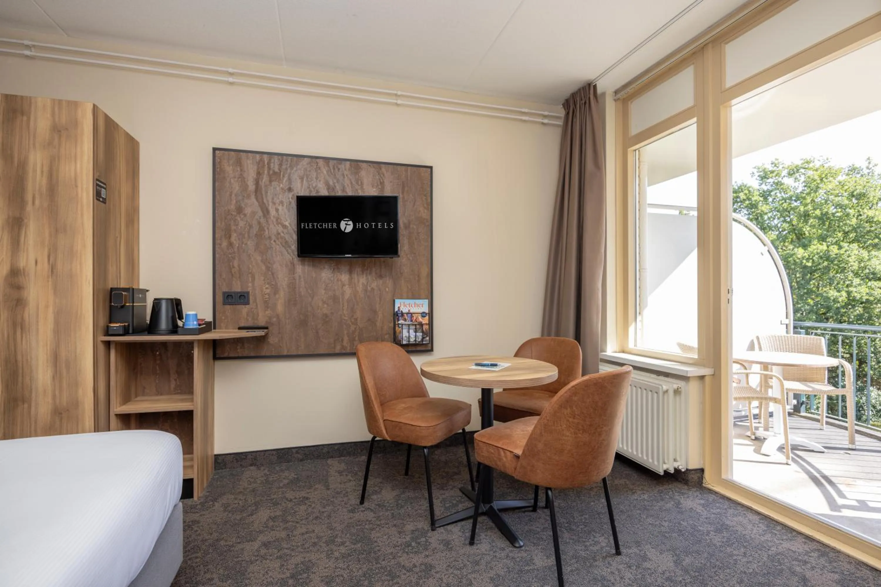 Bedroom in Fletcher Hotel Restaurant De Eese