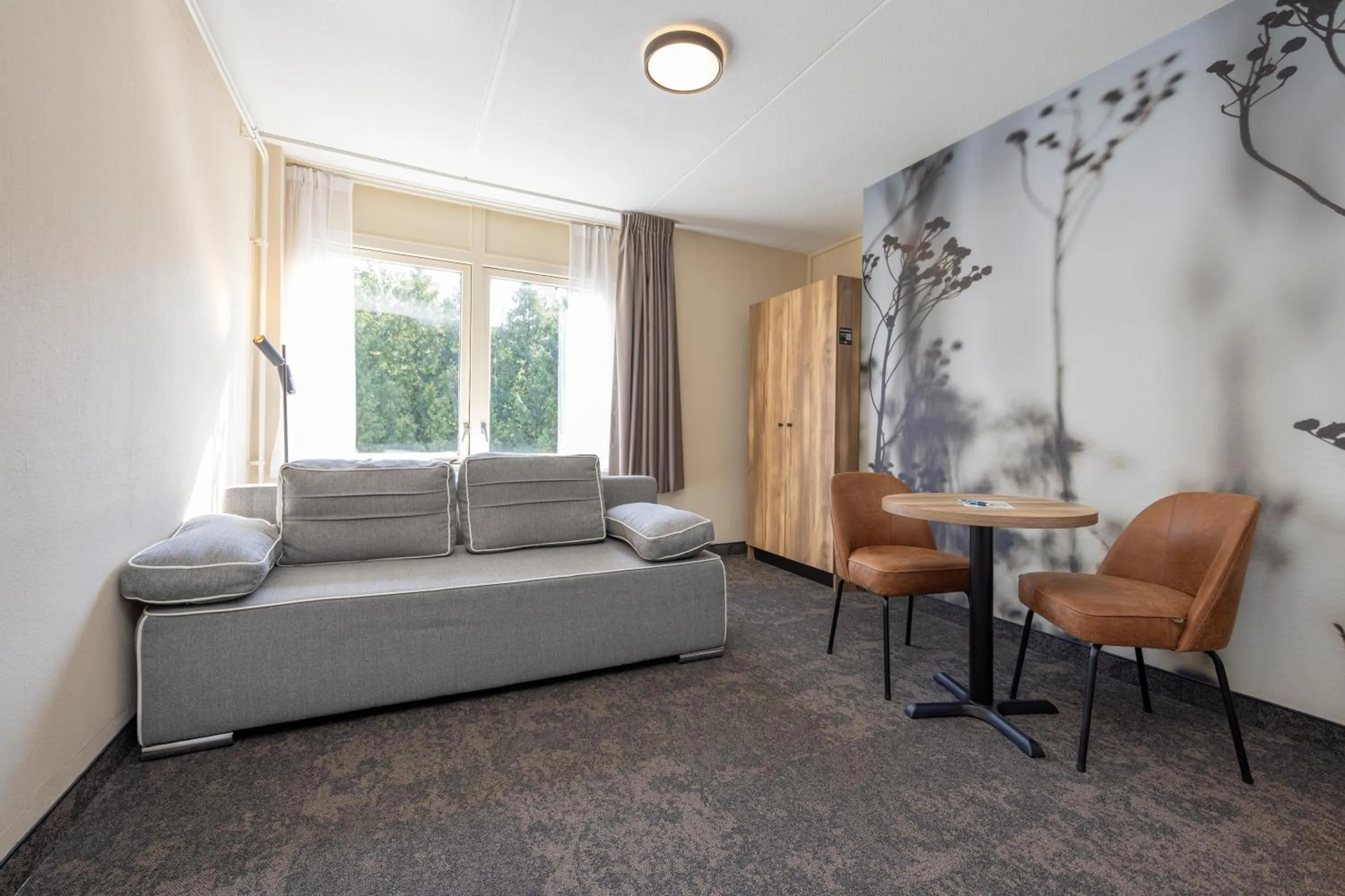 Seating area in Fletcher Hotel Restaurant De Eese