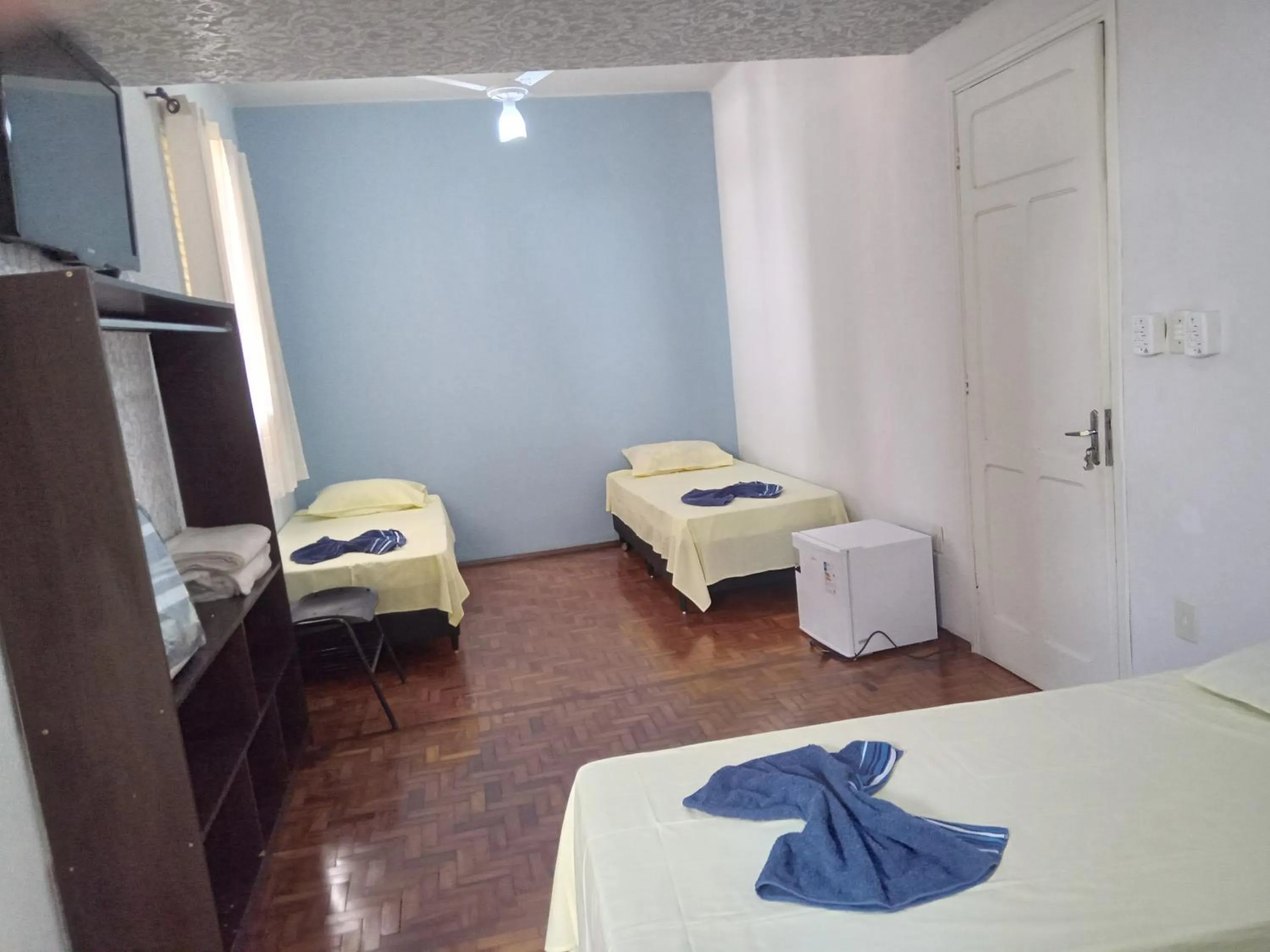 Bed in CENTRALHE HOTEL