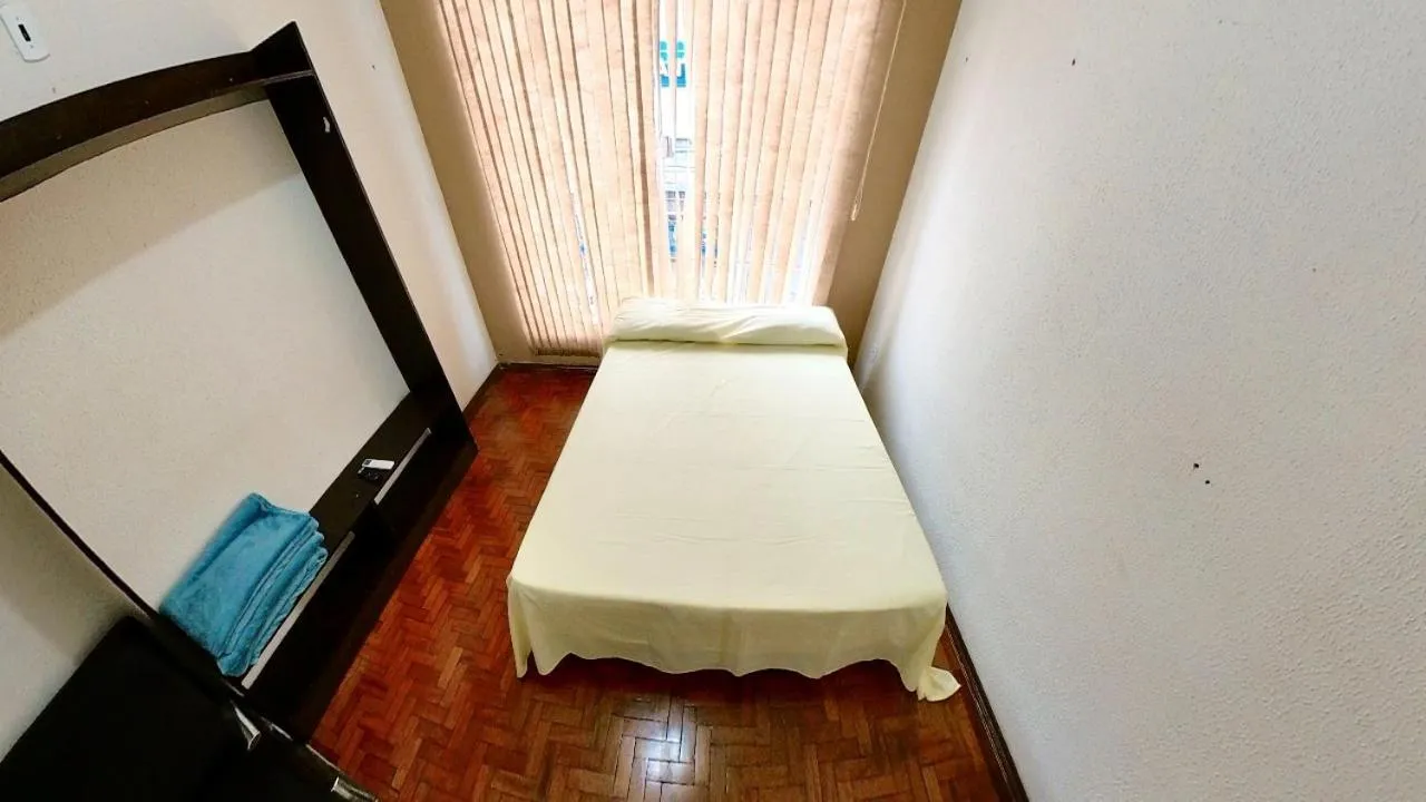 Bed in CENTRALHE HOTEL