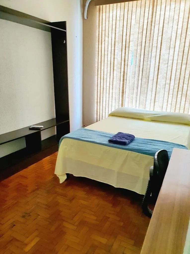 Bed in CENTRALHE HOTEL