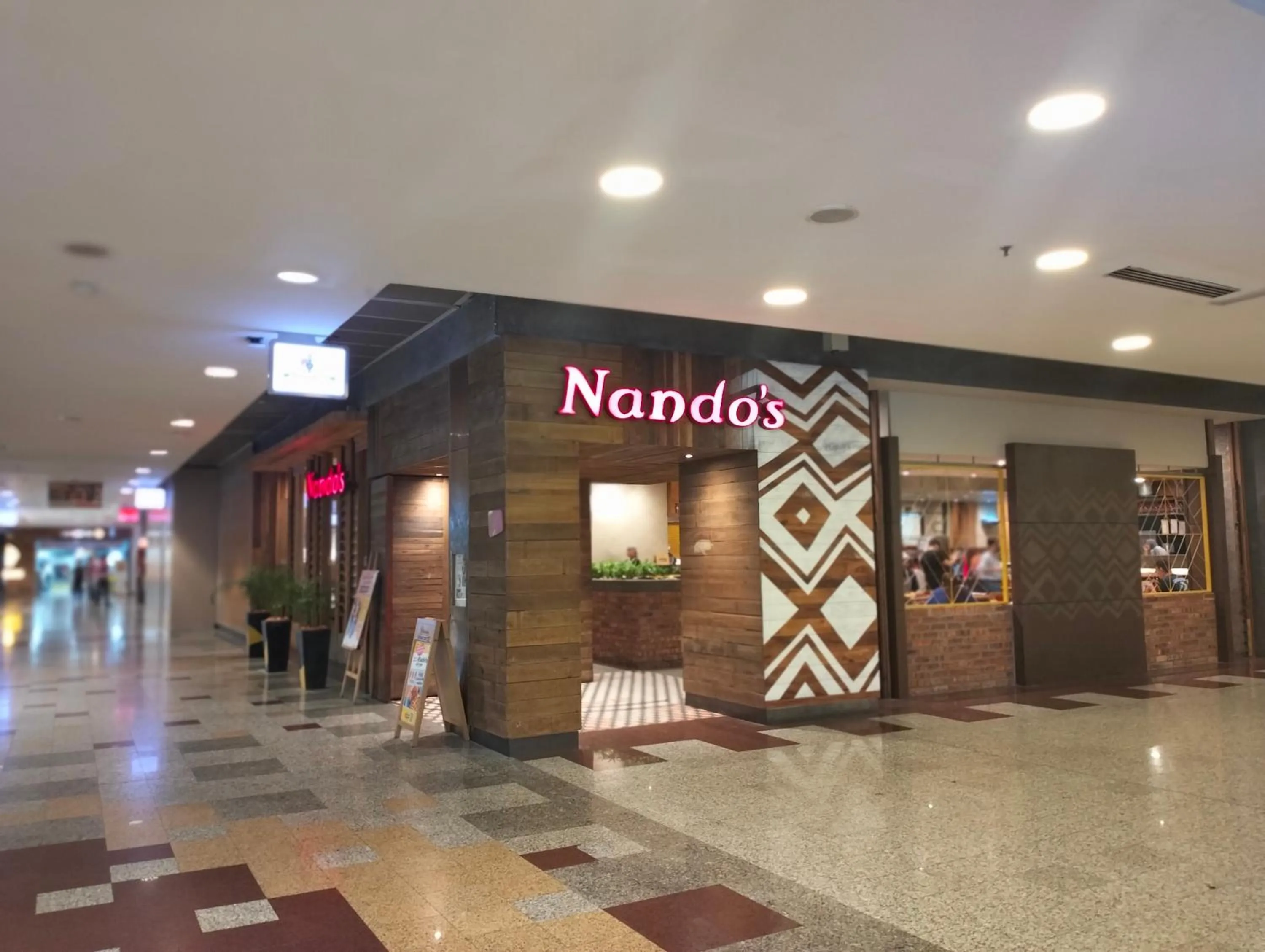 Text overlay in Times Square Kuala Lumpur By Service Suite