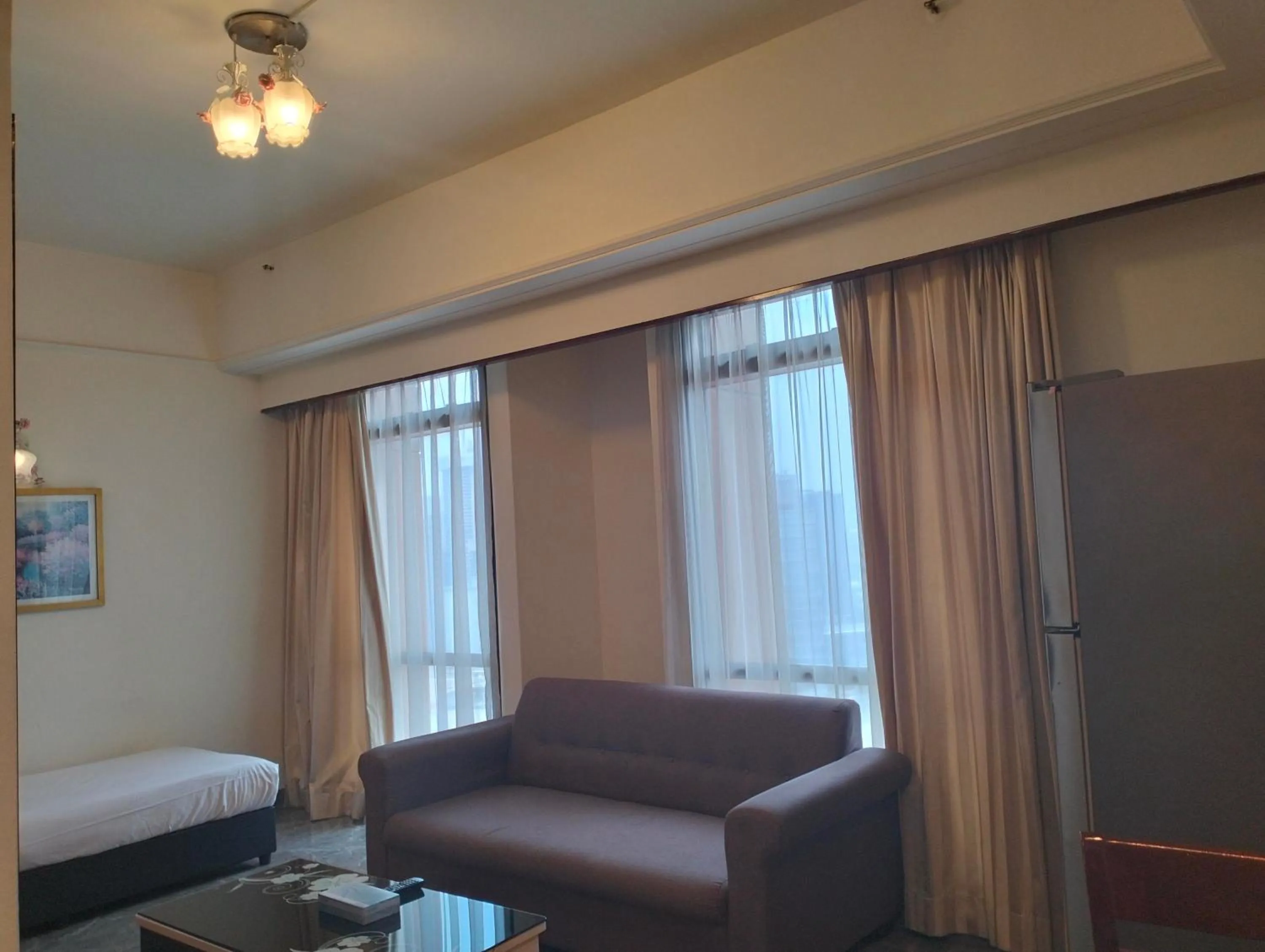 Living room, Bed in Times Square Kuala Lumpur By Service Suite