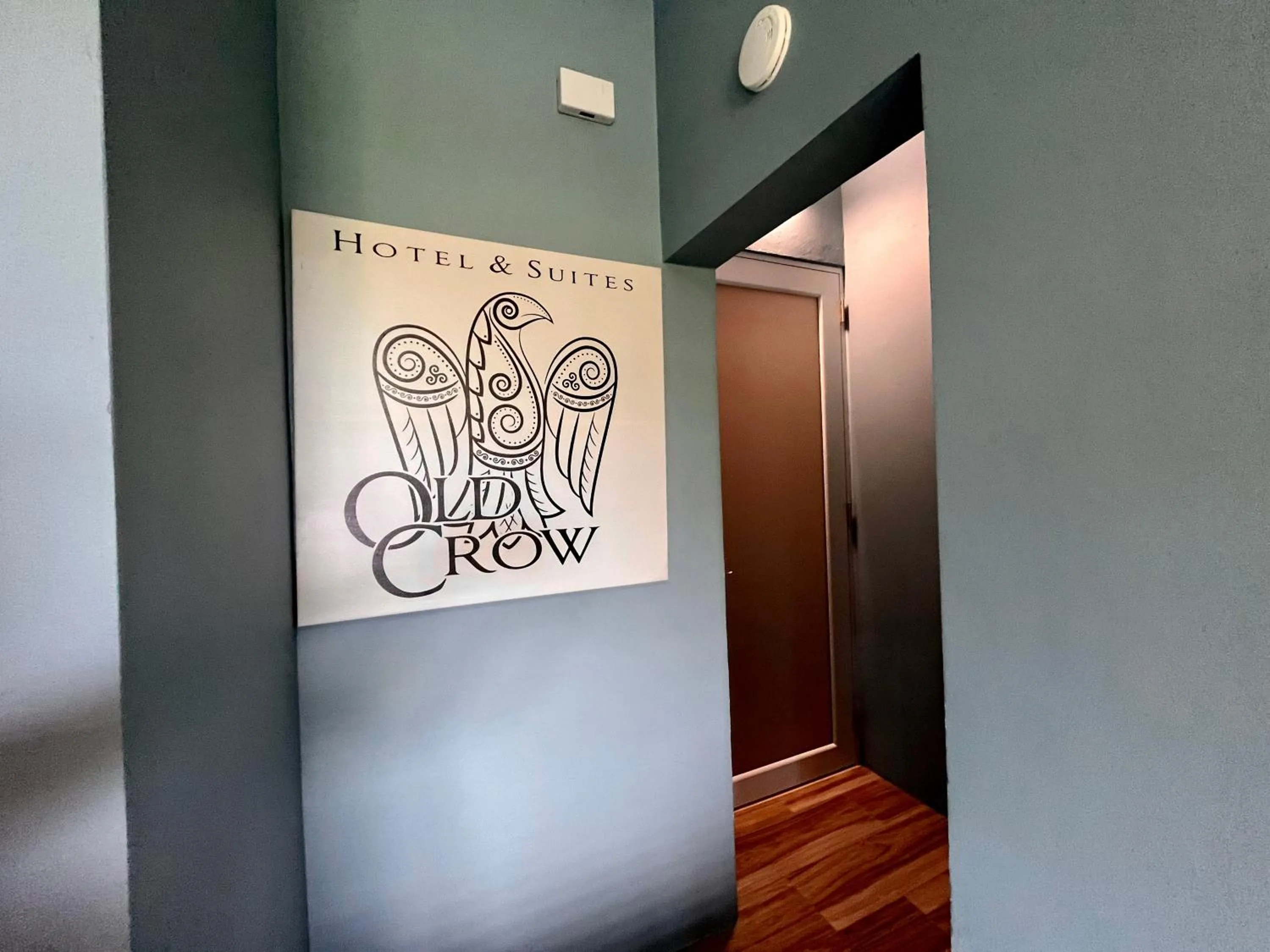 Property logo or sign in Old Crow Hotel and Suites