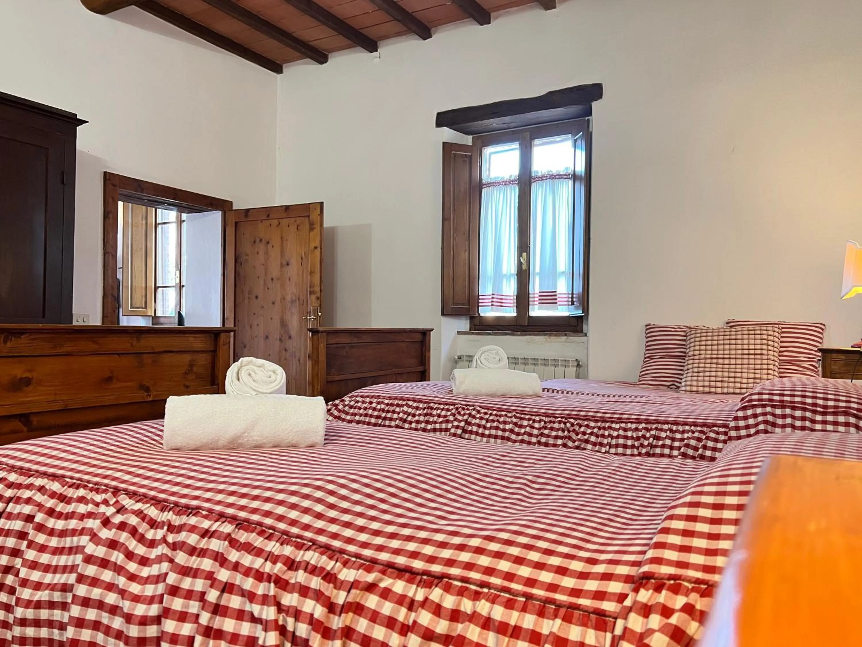 Bed in Fattoria Lornano Winery