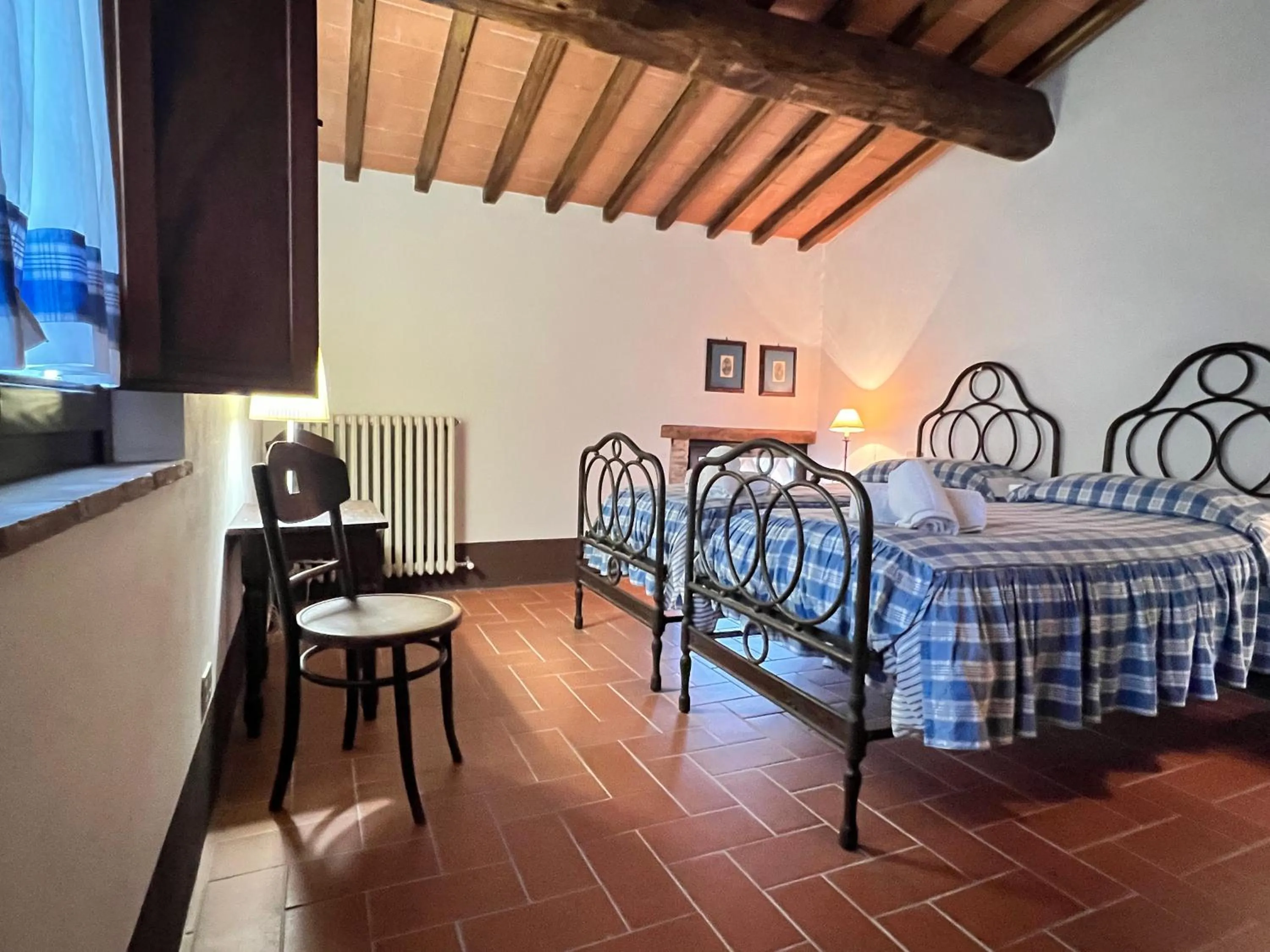 Bed in Fattoria Lornano Winery