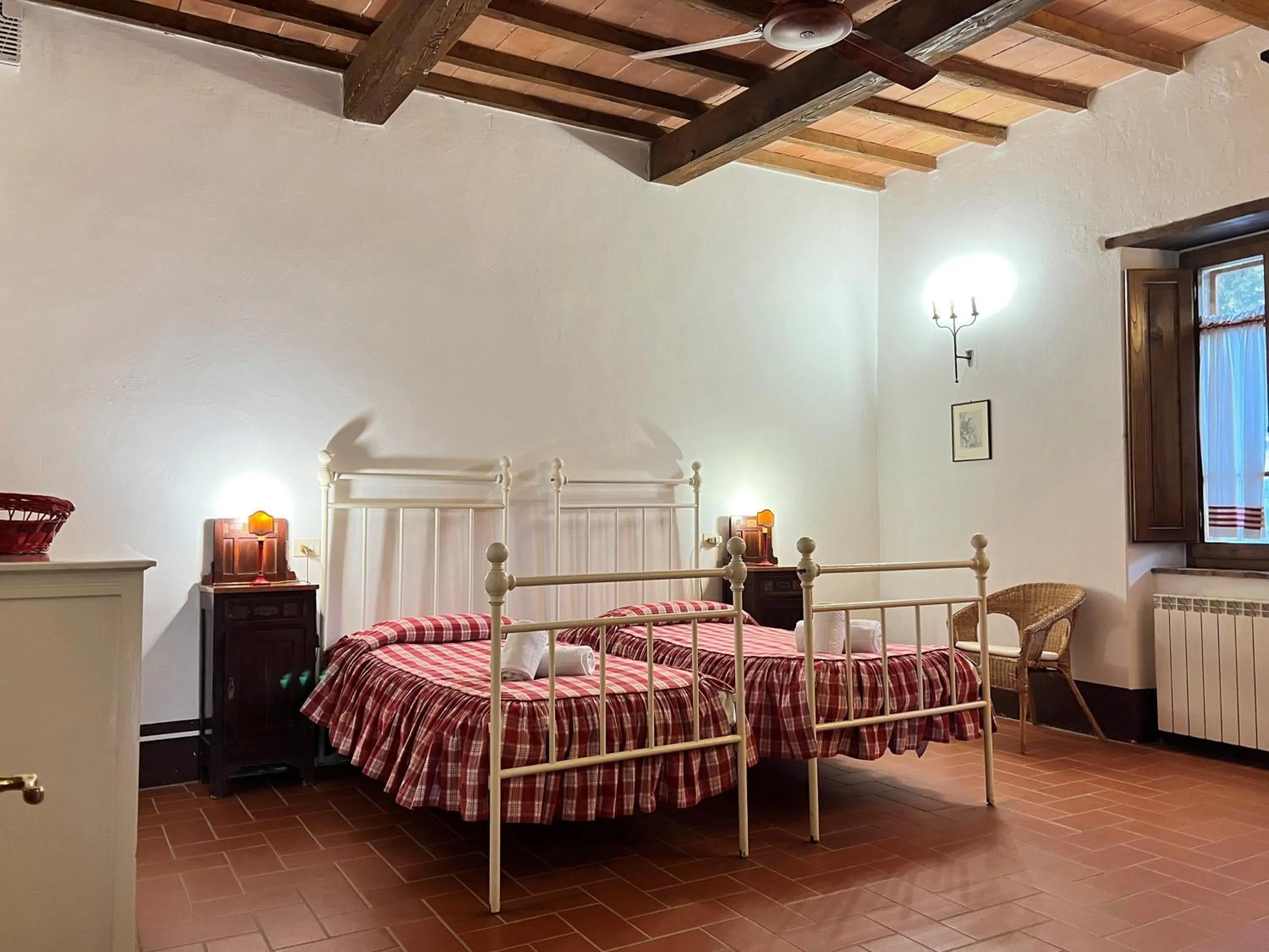 Bed in Fattoria Lornano Winery