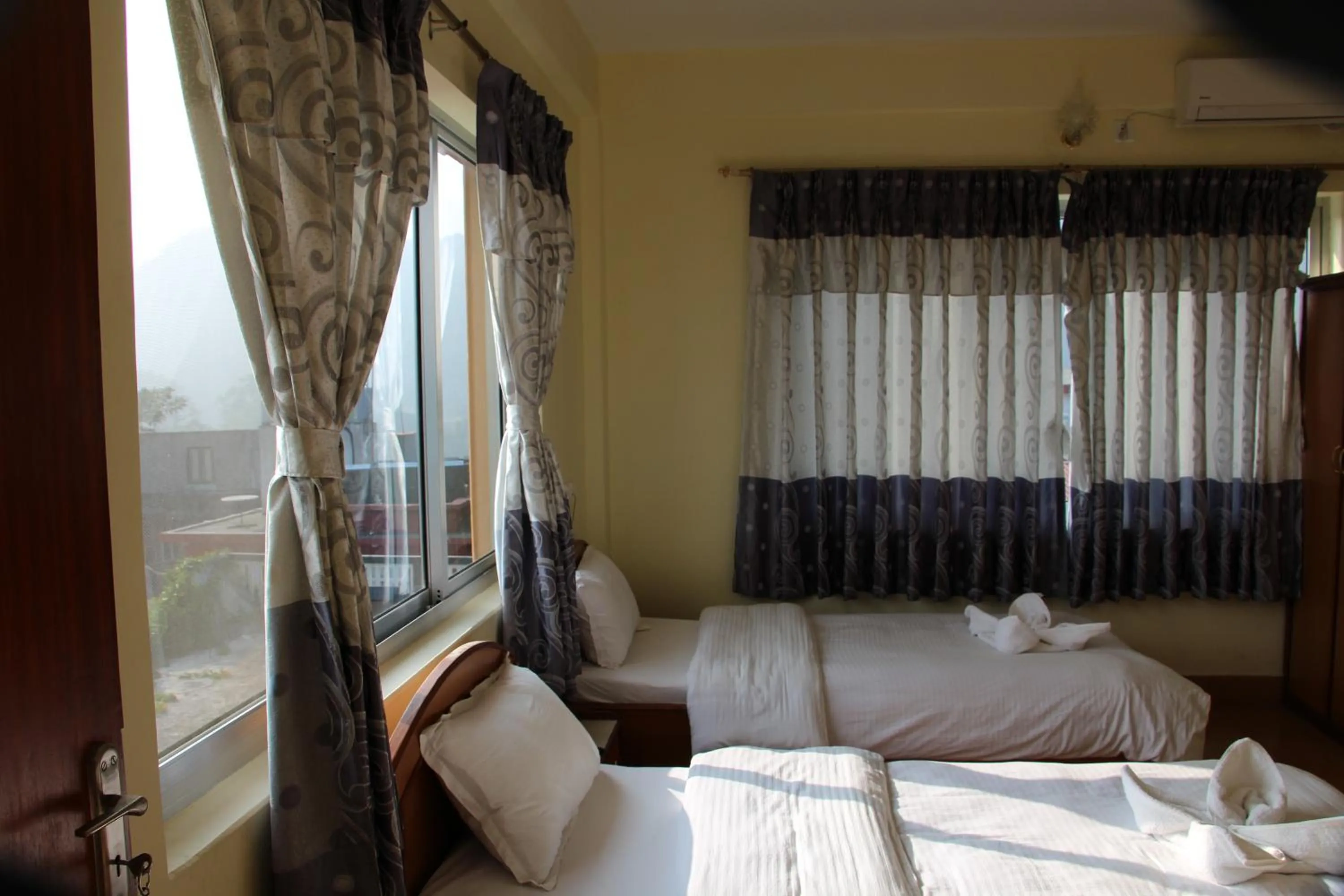 Bed in Hotel Milarepa Pvt Ltd