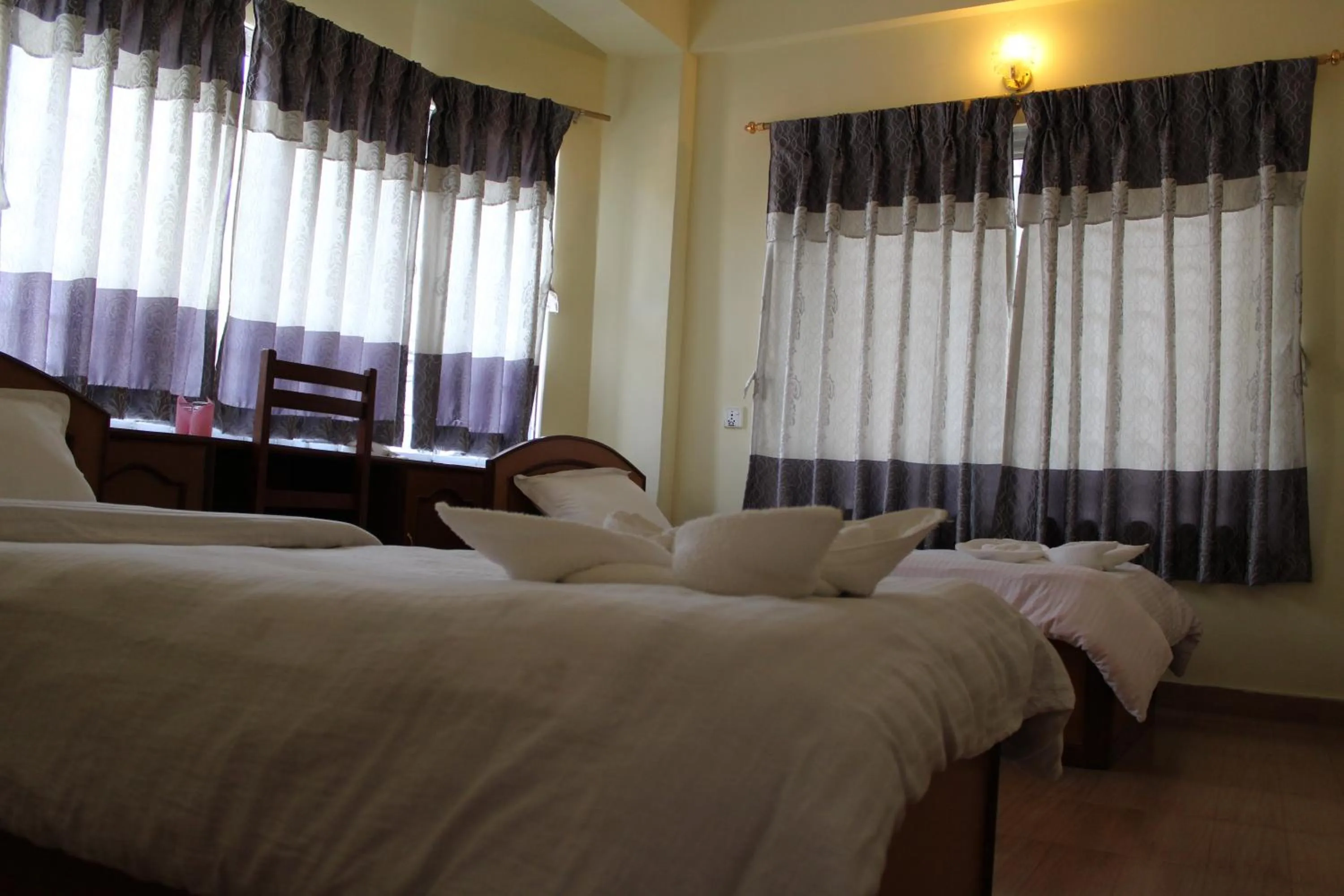 Bedroom in Hotel Milarepa Pvt Ltd